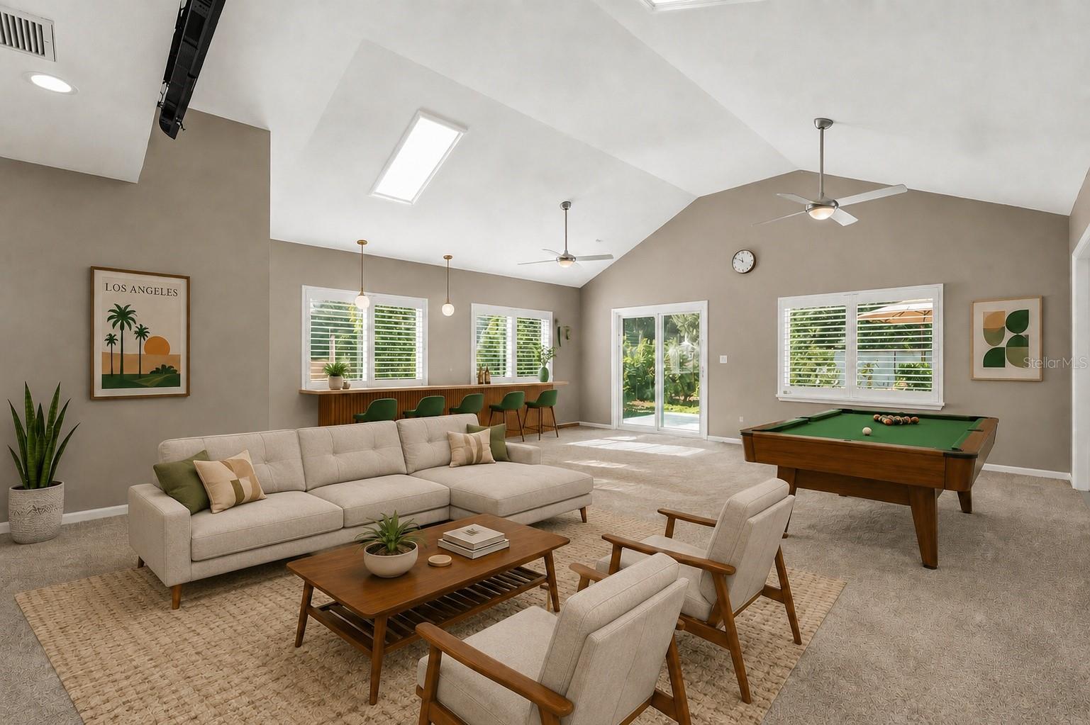 arge bonus room with 1/2 bath ensuite with doors to back yard