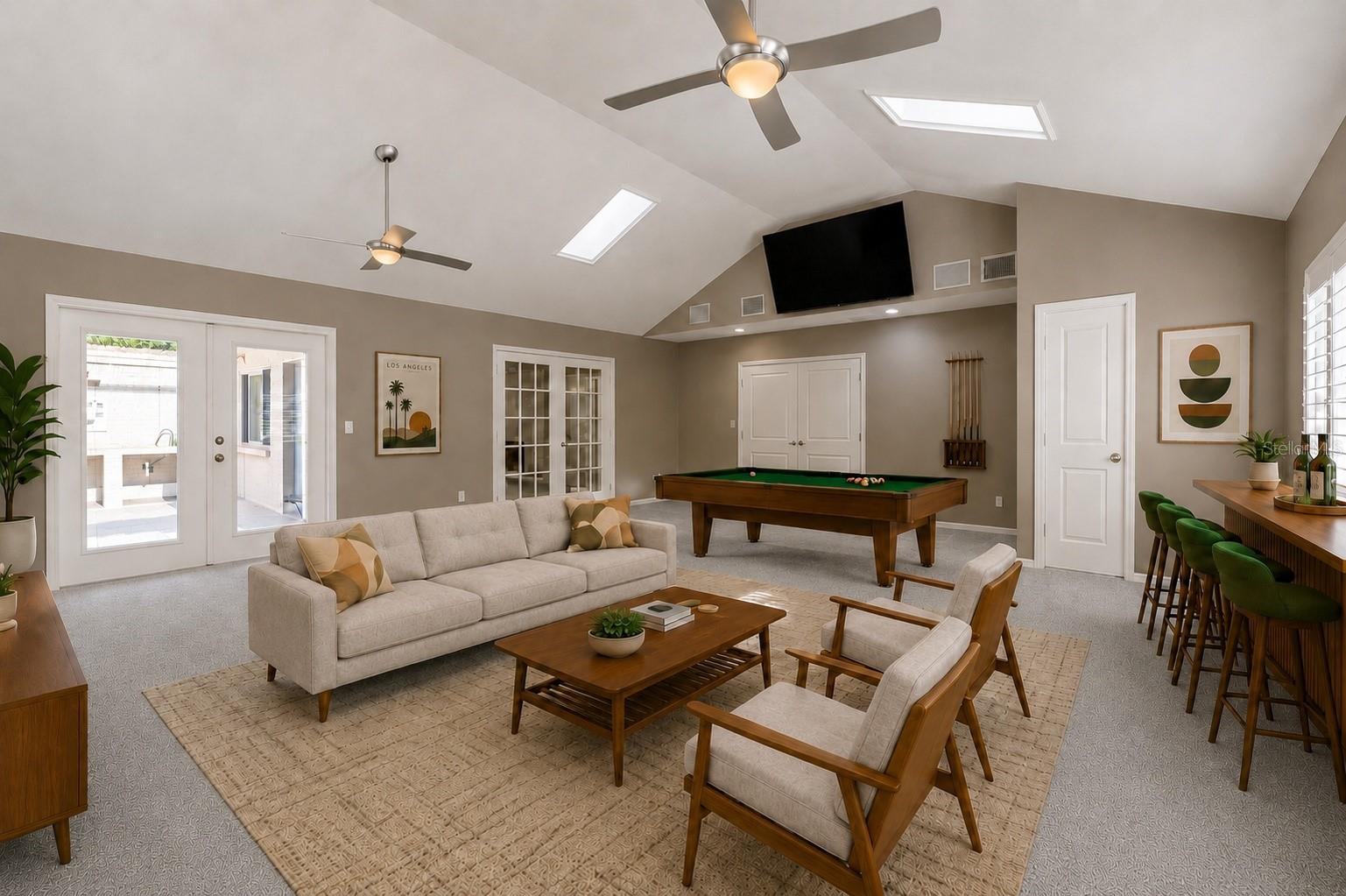 arge bonus room with french doors into dining/formal living room and primary bedroom