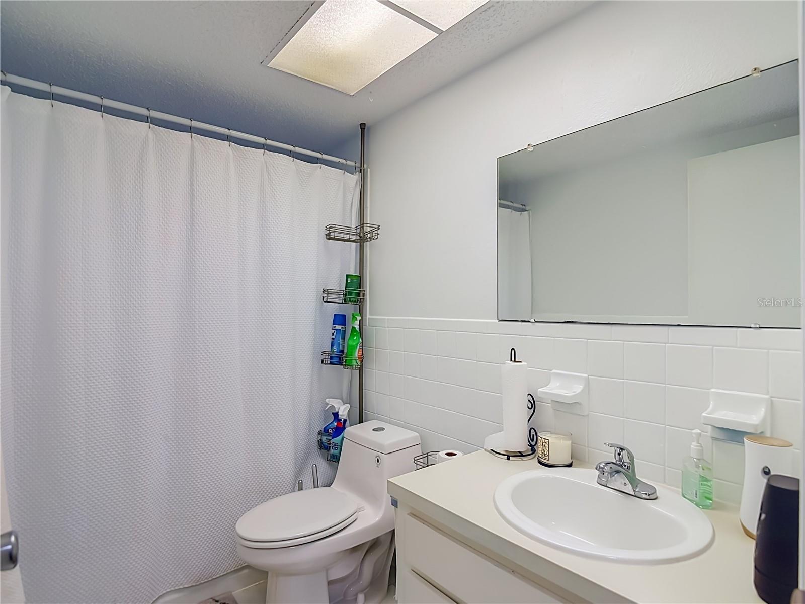 full bath with tub and shower