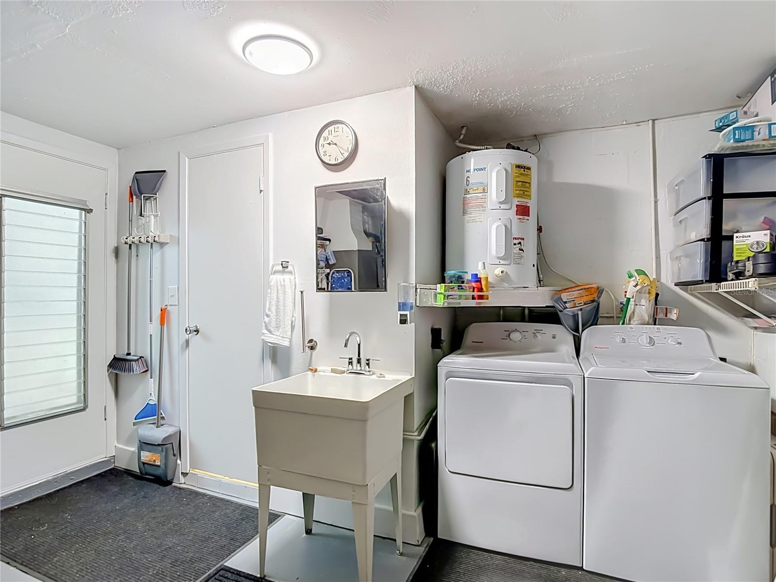 garage with washer and dryer included