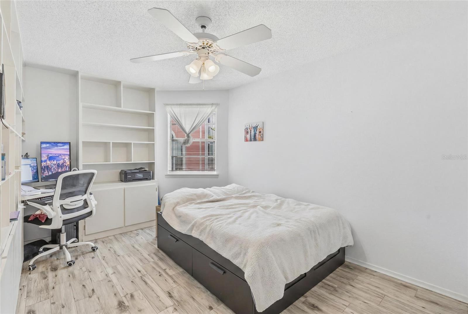 2nd Bedroom with built in book shelfs and desk