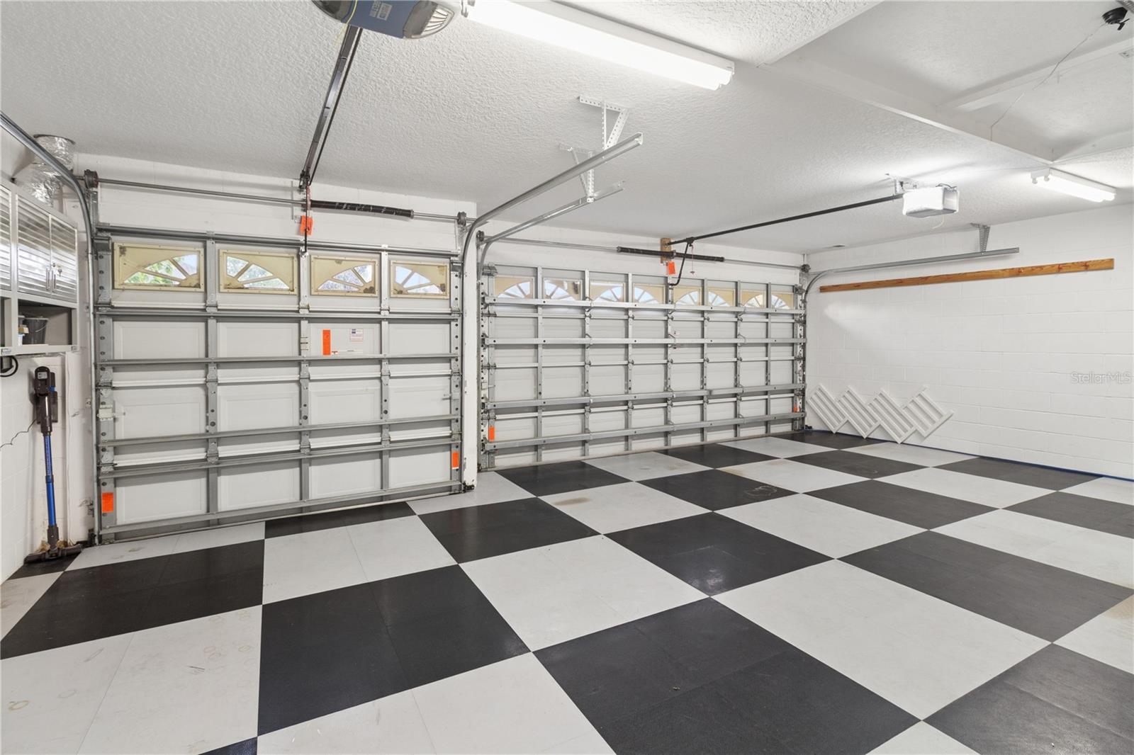 The oversized 3-car garage offers plenty of room for vehicles, storage, hobbies, and all your Florida lifestyle essentials.