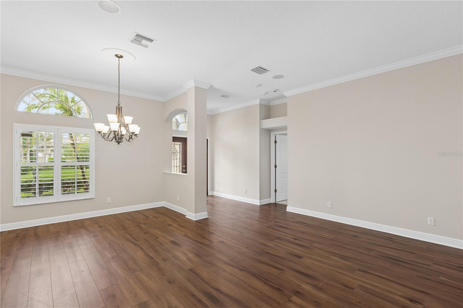 The grand entry welcomes you with beautiful formal living room and dining room, offering an elegant space to gather with family, entertain guests, or celebrate life's special moments.