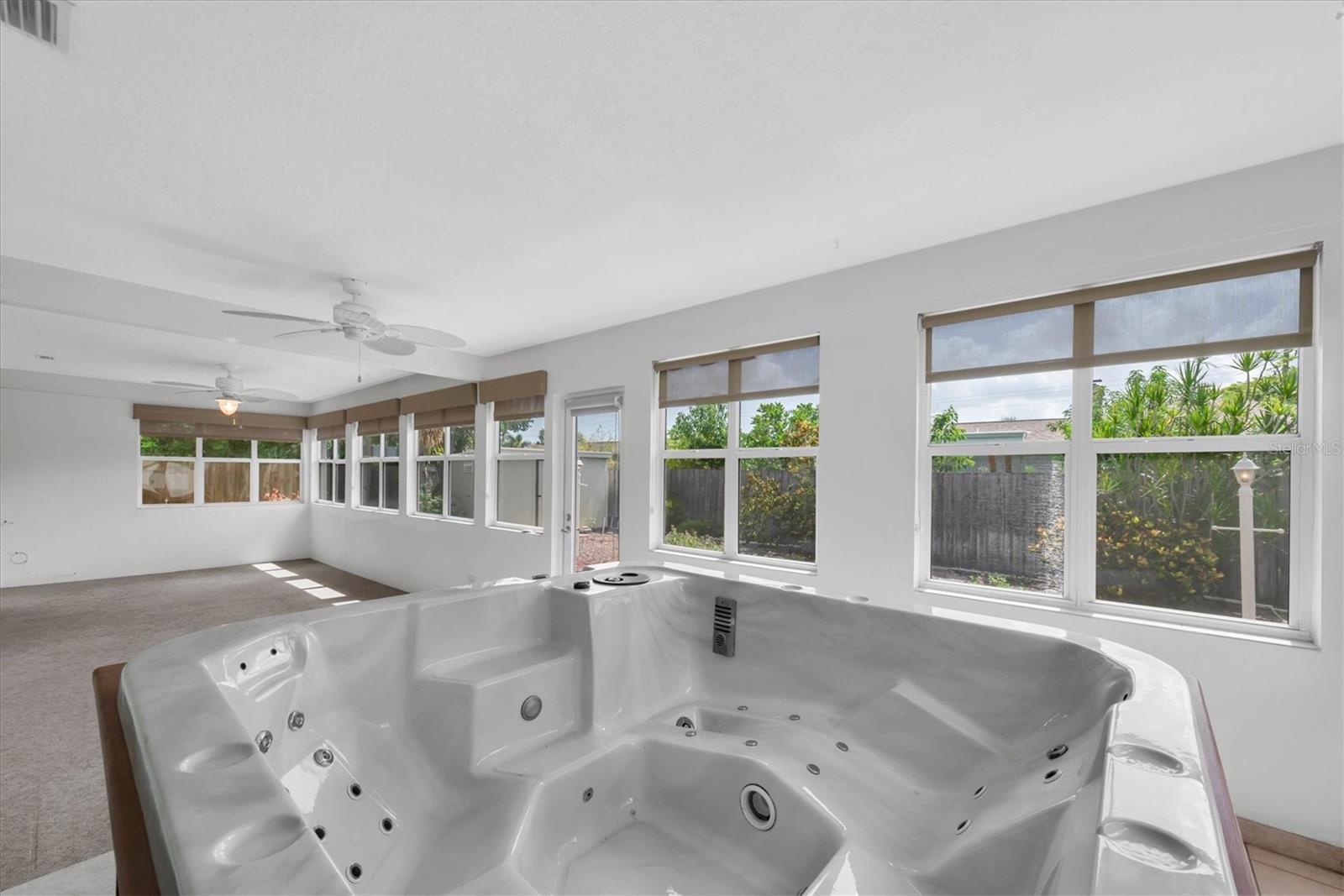 Amazing spa area featuring a relaxing retreat for your enjoyment. Perfect for unwinding after a long day, this space offers ultimate tranquility and comfort.