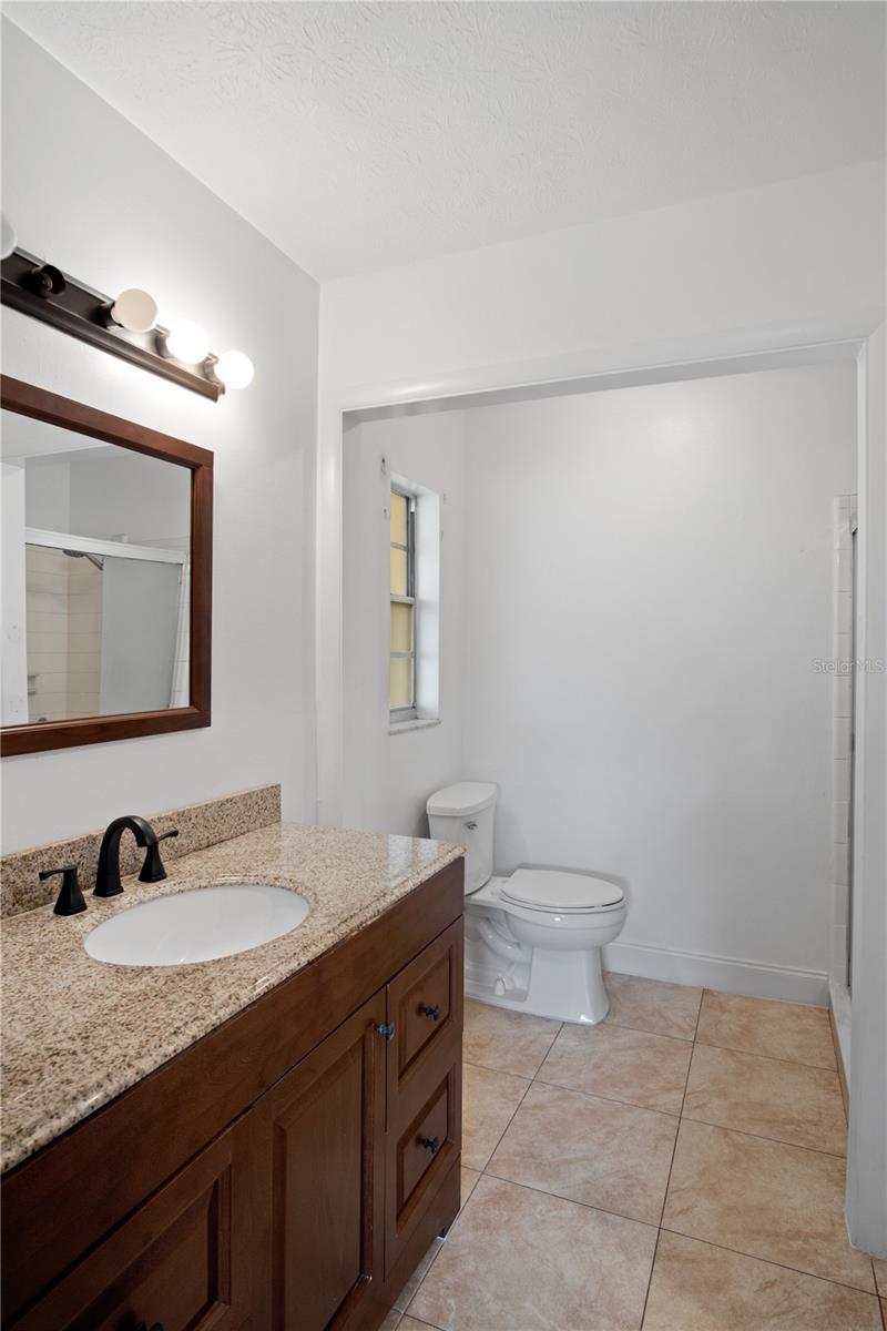En suite primary bathroom - shower and walk in closet