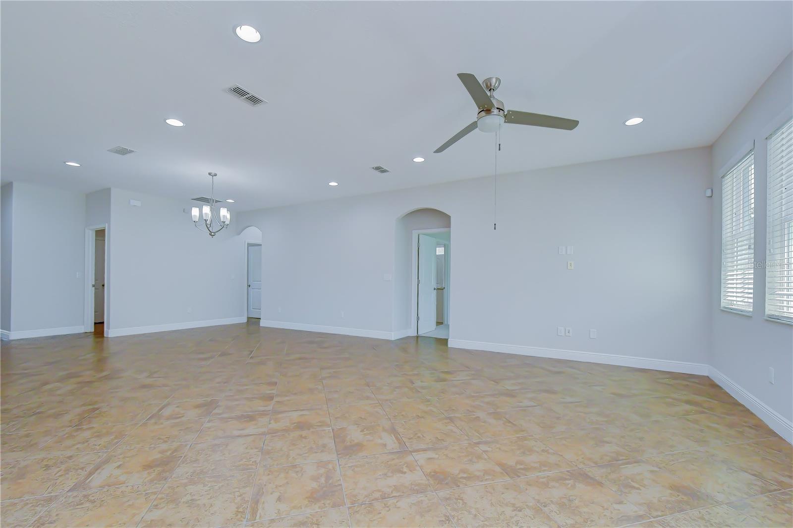Spacious gathering area with abundant natural light.