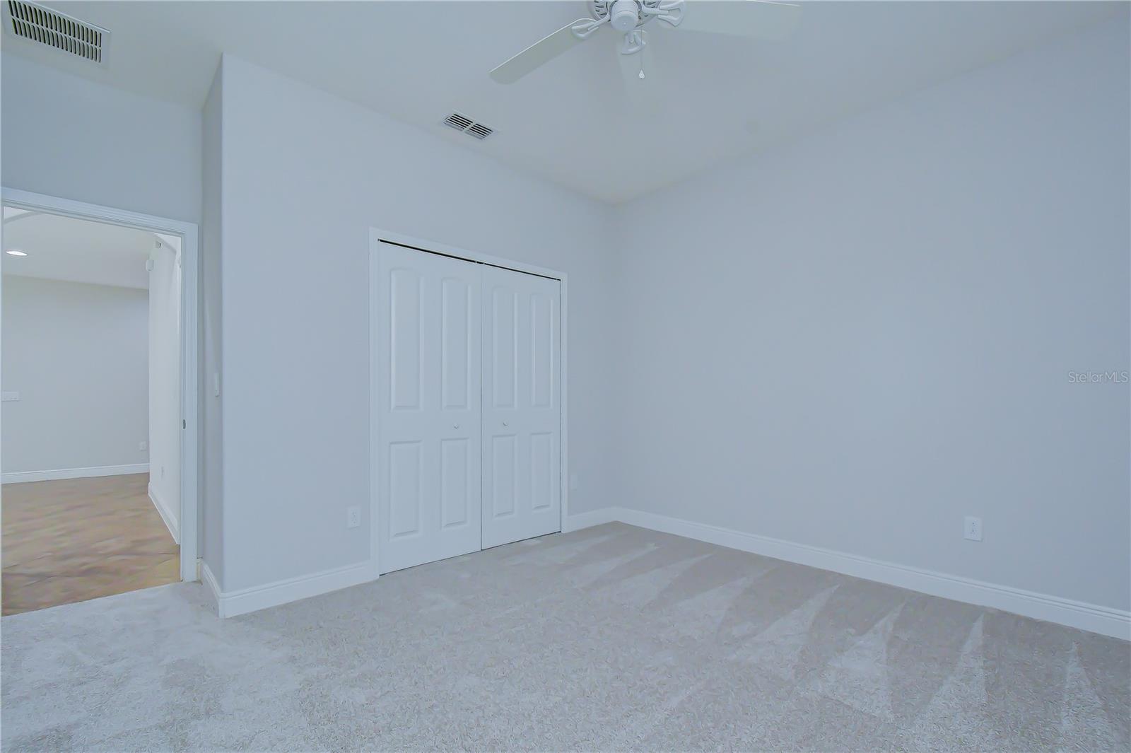 Comfortable secondary bedroom.