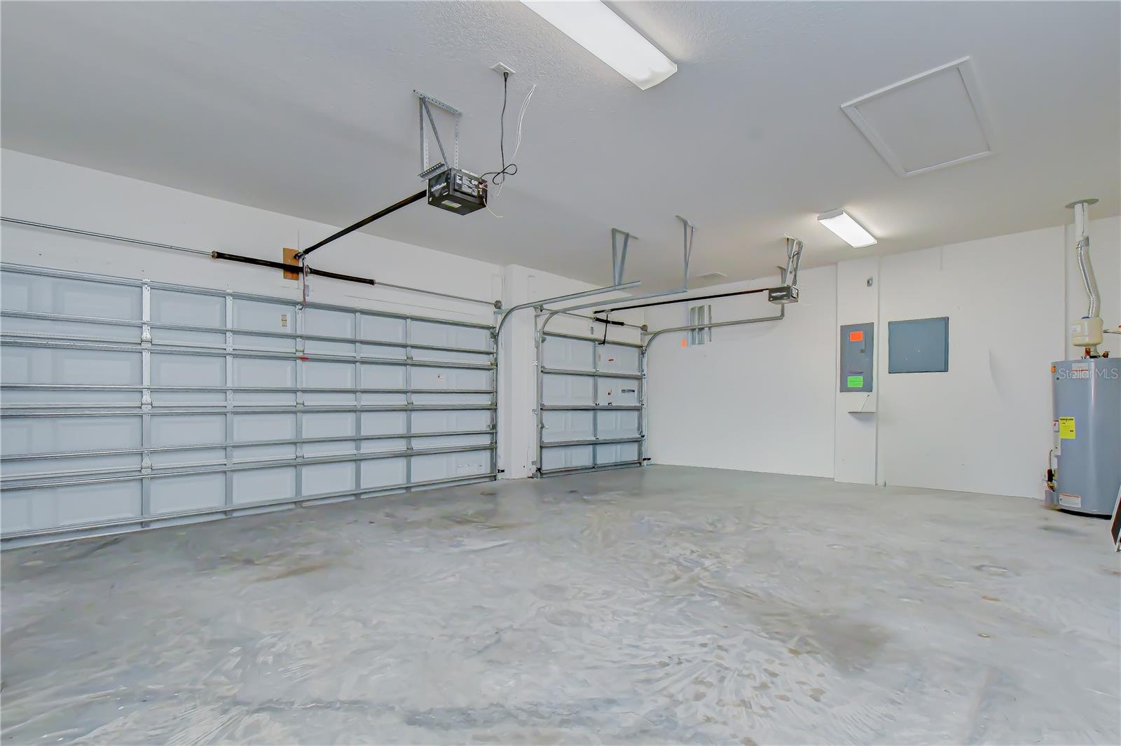 Spacious three-car garage with ample storage.