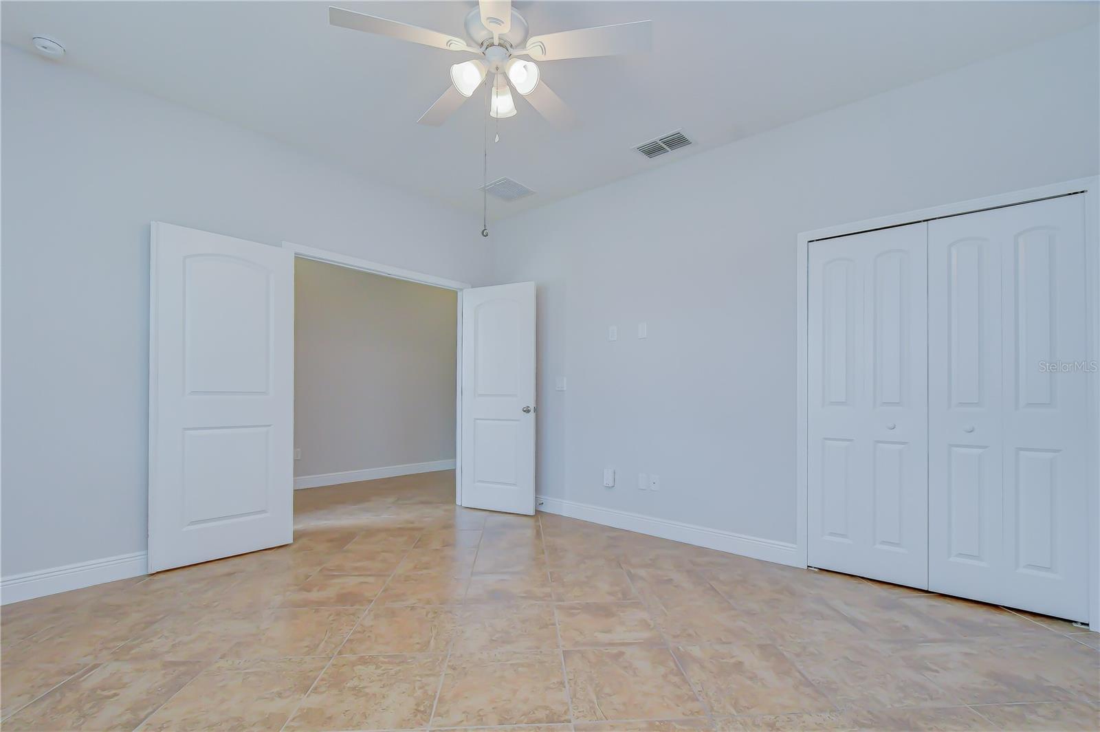 Private office with elegant French doors.