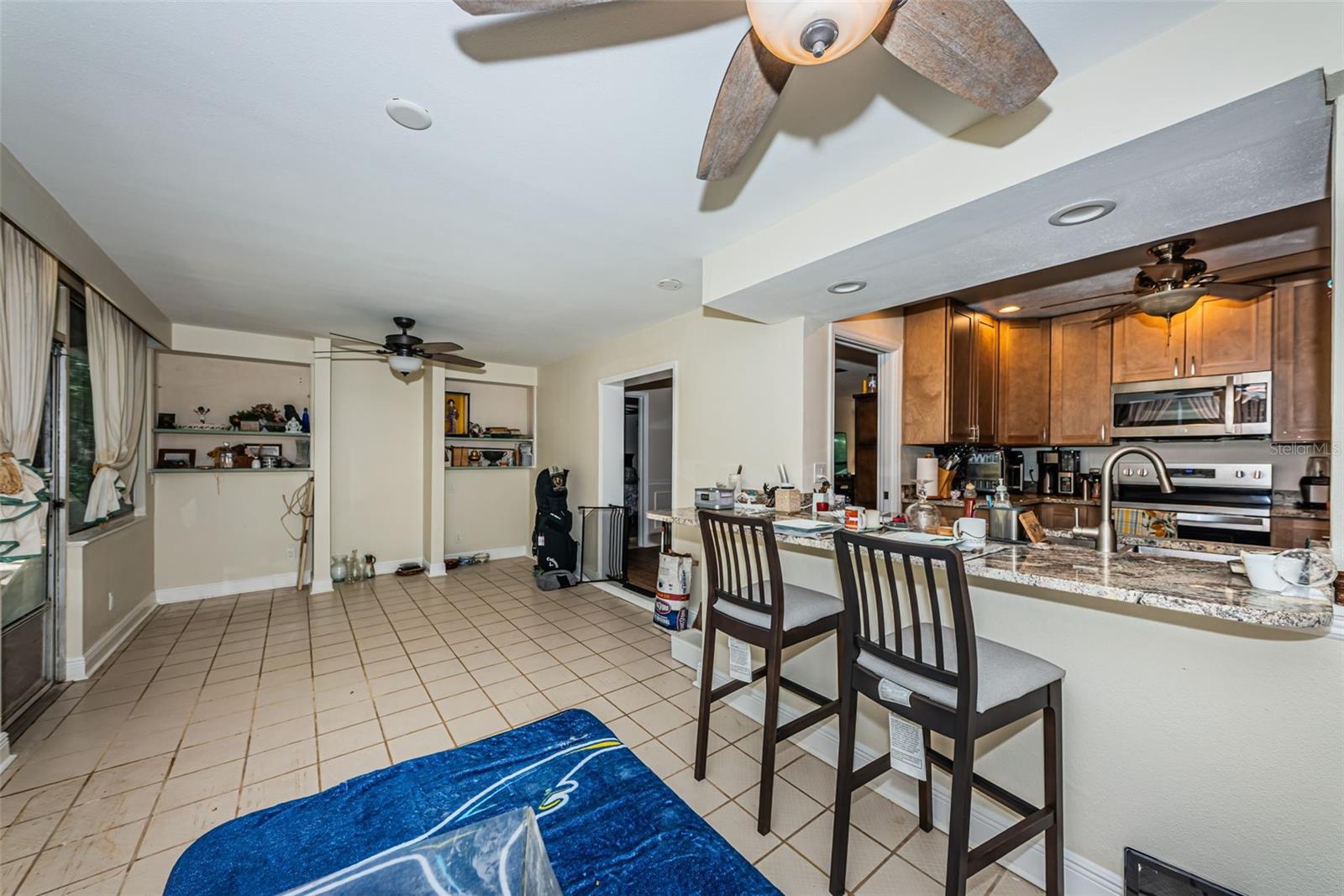 Kitchen pass through with breakfast bar