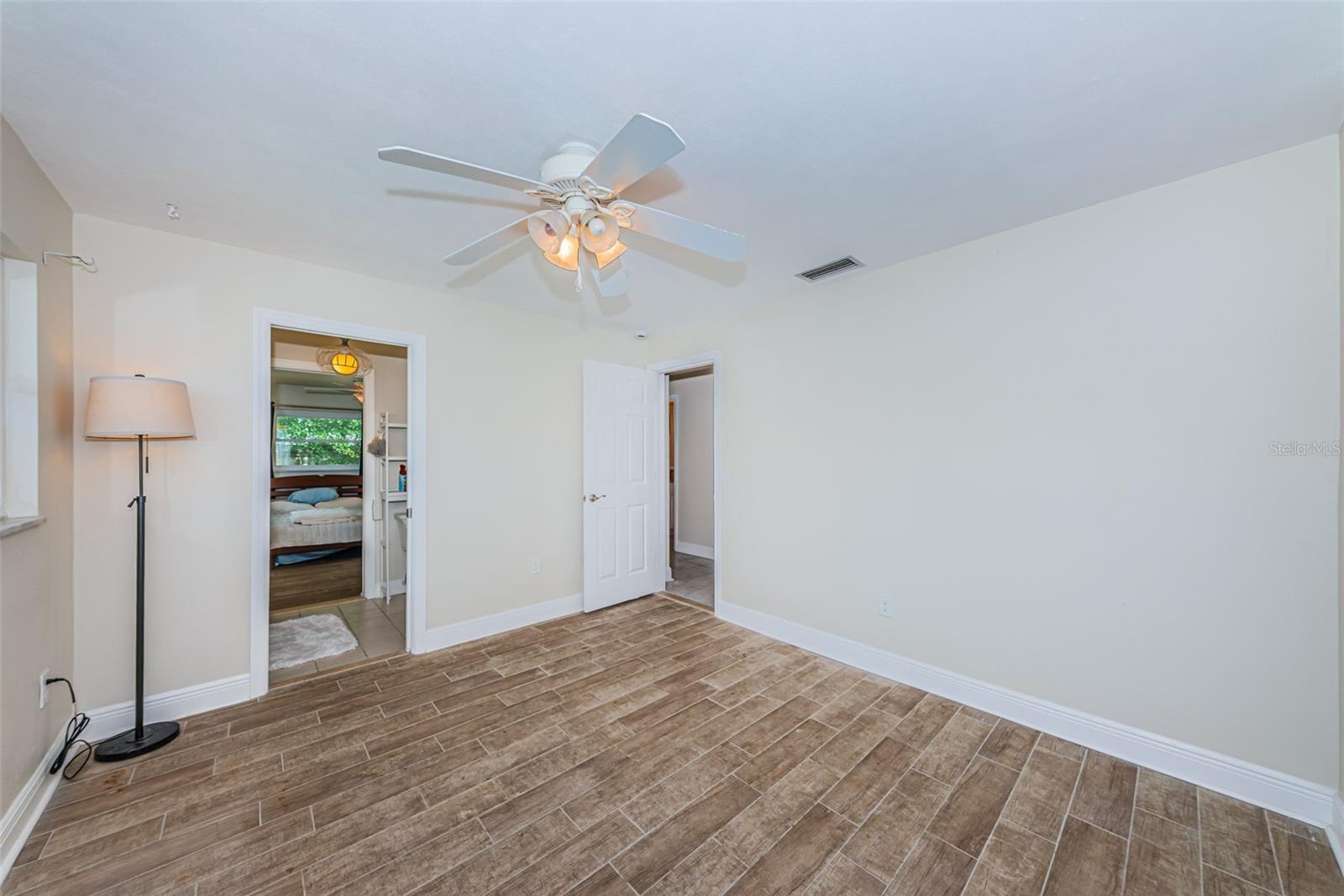 Bedroom 3 with pretty flooring