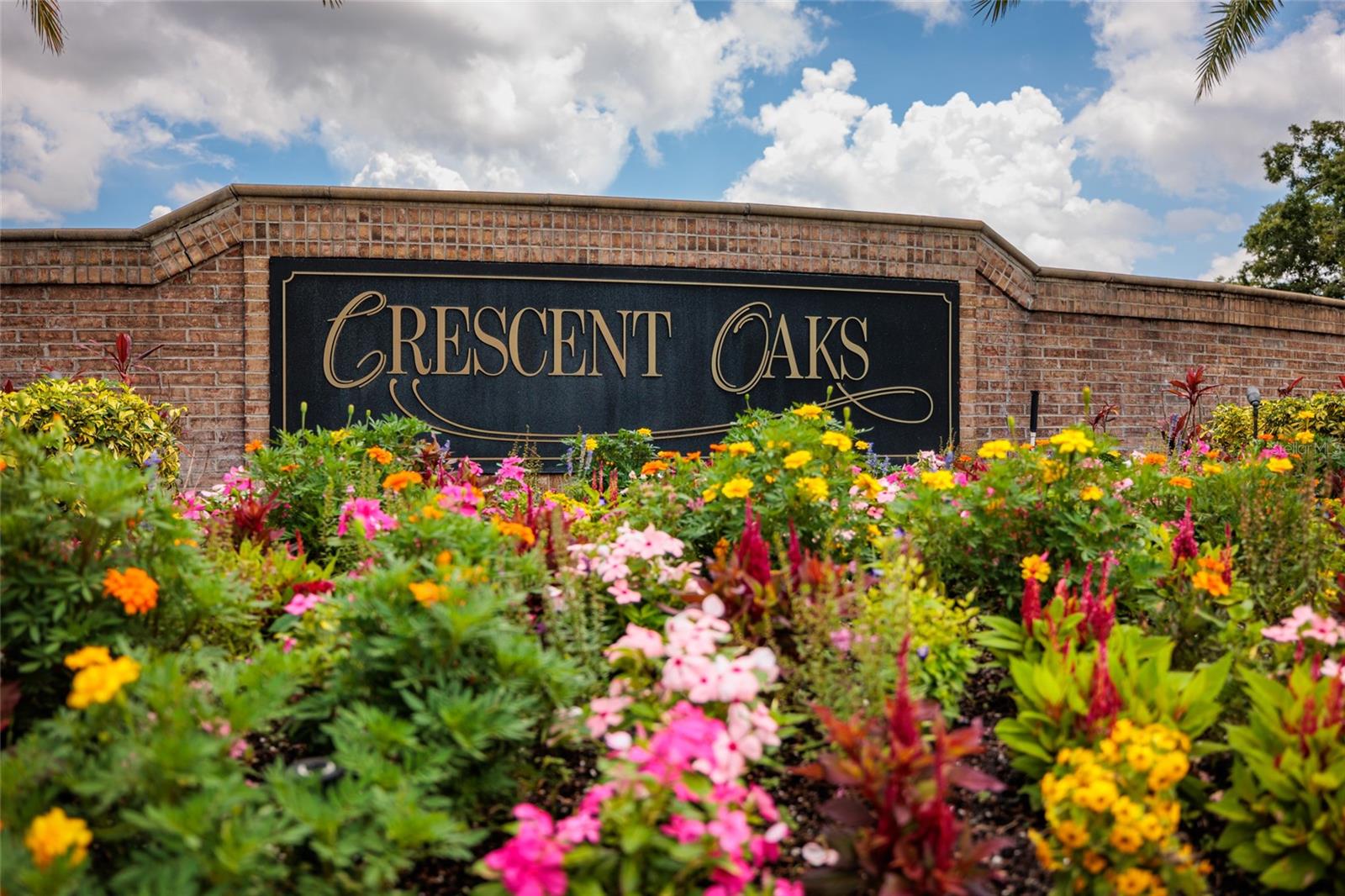 Beautiful Crescent Oaks, a gated, guarded golf course community