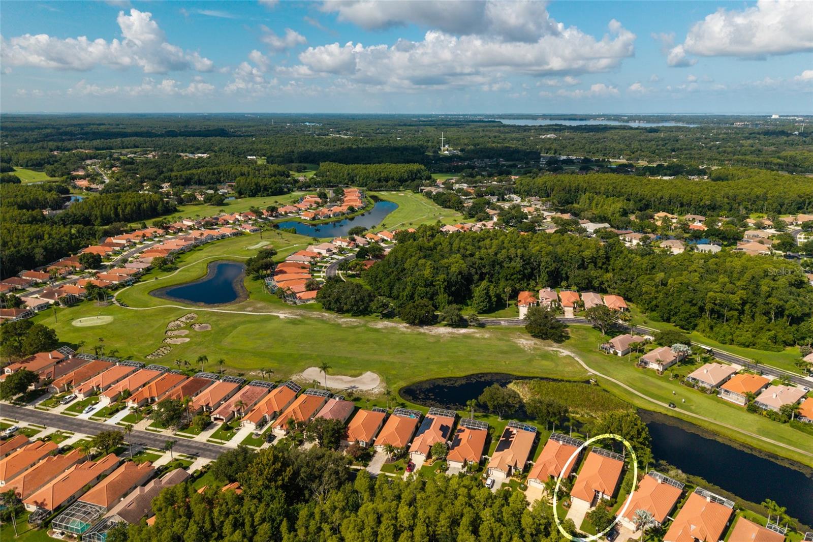 Ariel views of several lakes and the golf course
