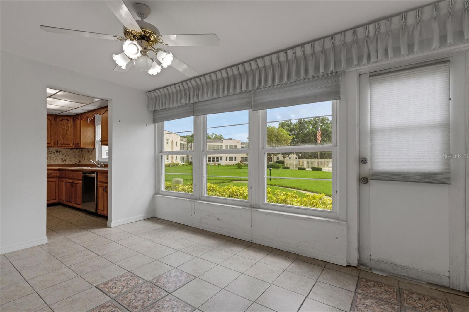 Florida Room With Pedestrian Door to Pool and Clubhouse and Kitchen Access.