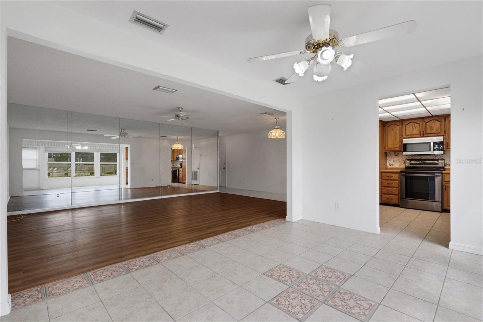 Florida Room Looking to Living Room and Kitchen