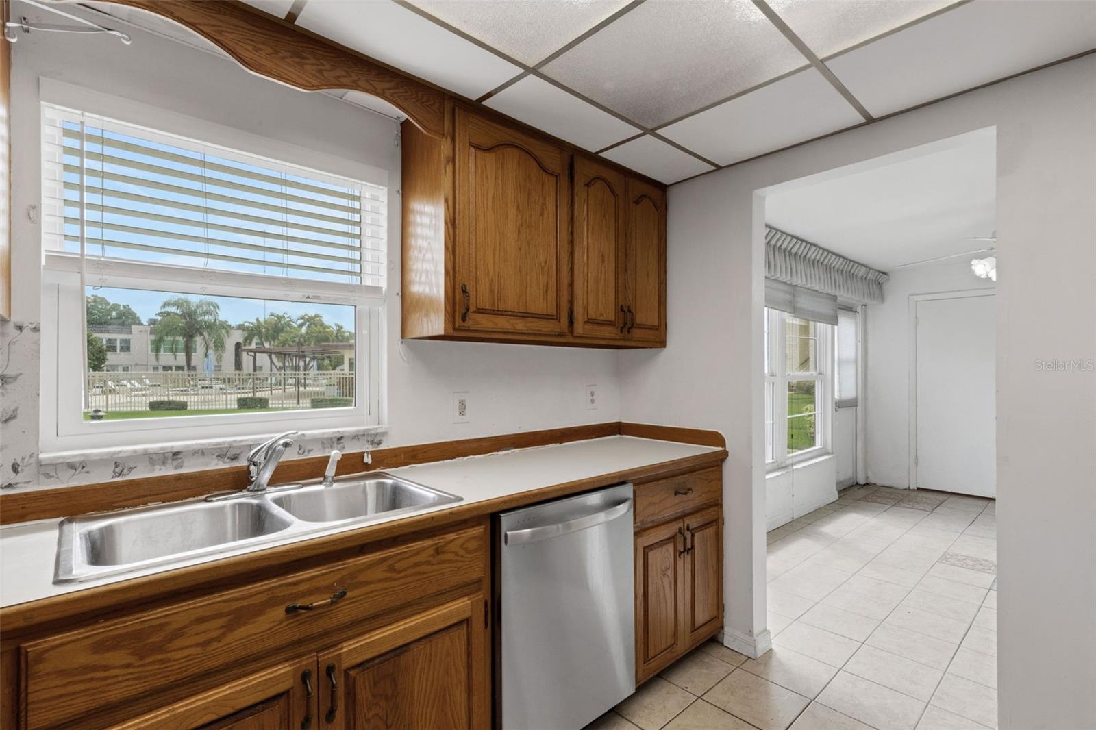 Updated Kitchen with View of Pool and Clubhouse