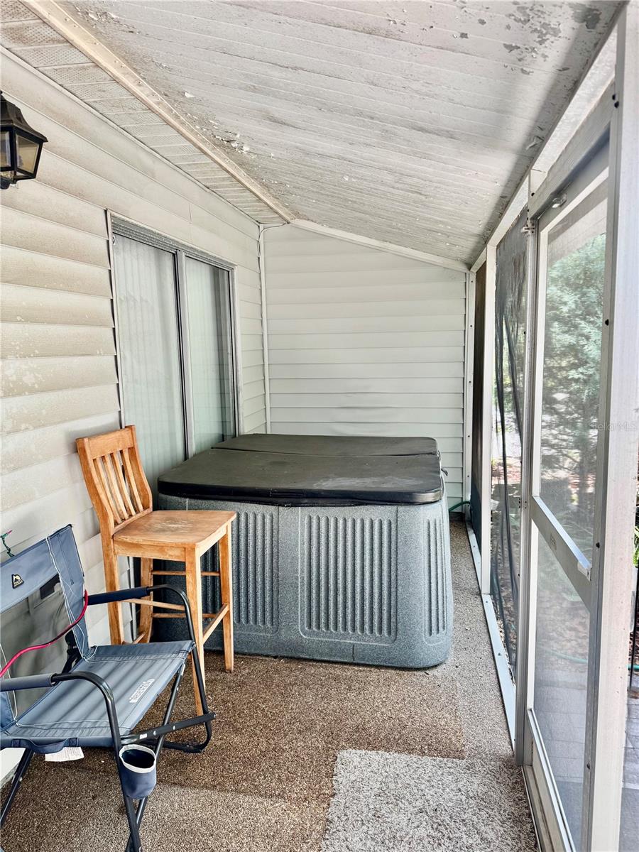 Hot Tub on screened porch