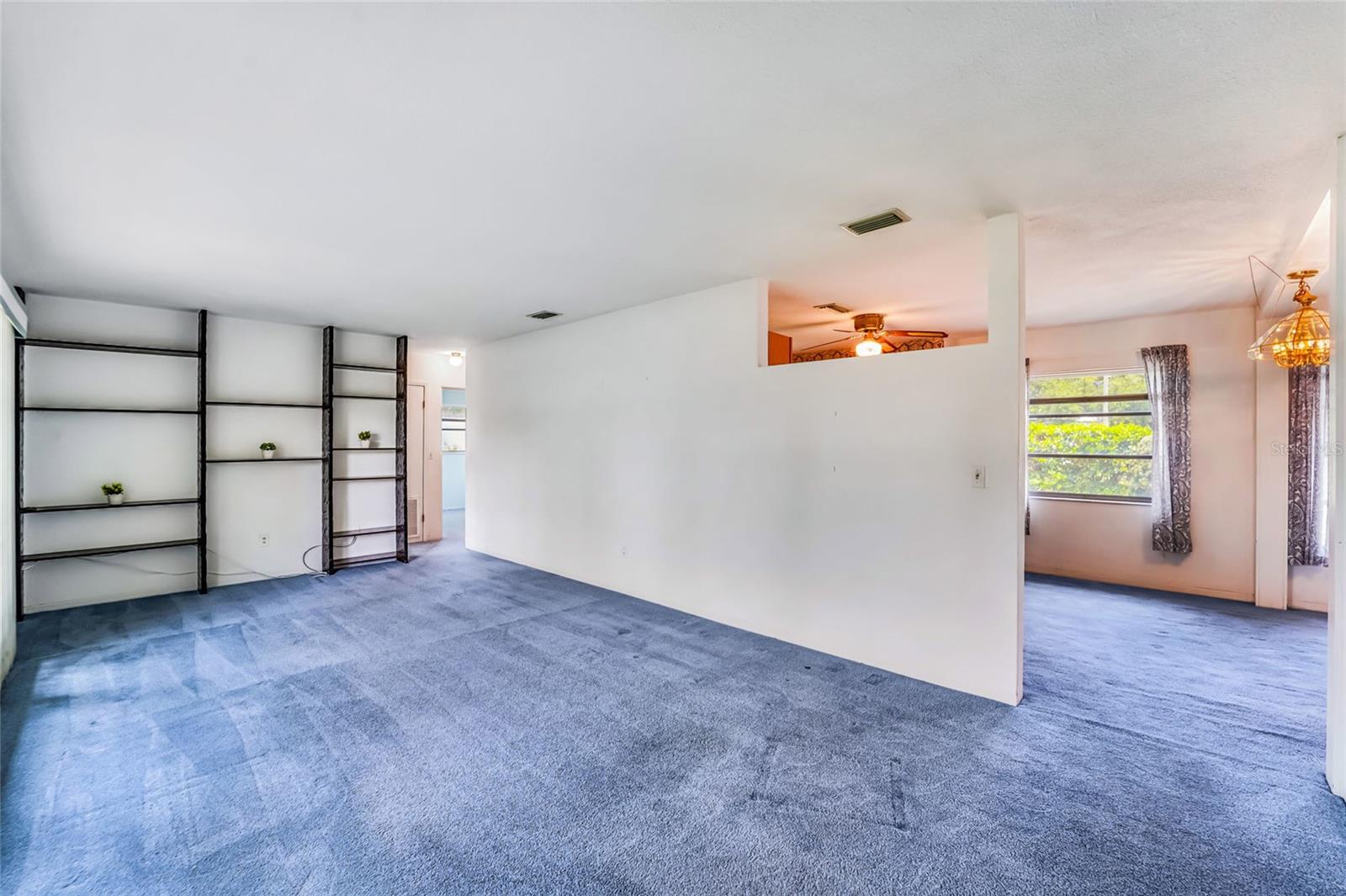 Living room  - remove the wall and open it up!