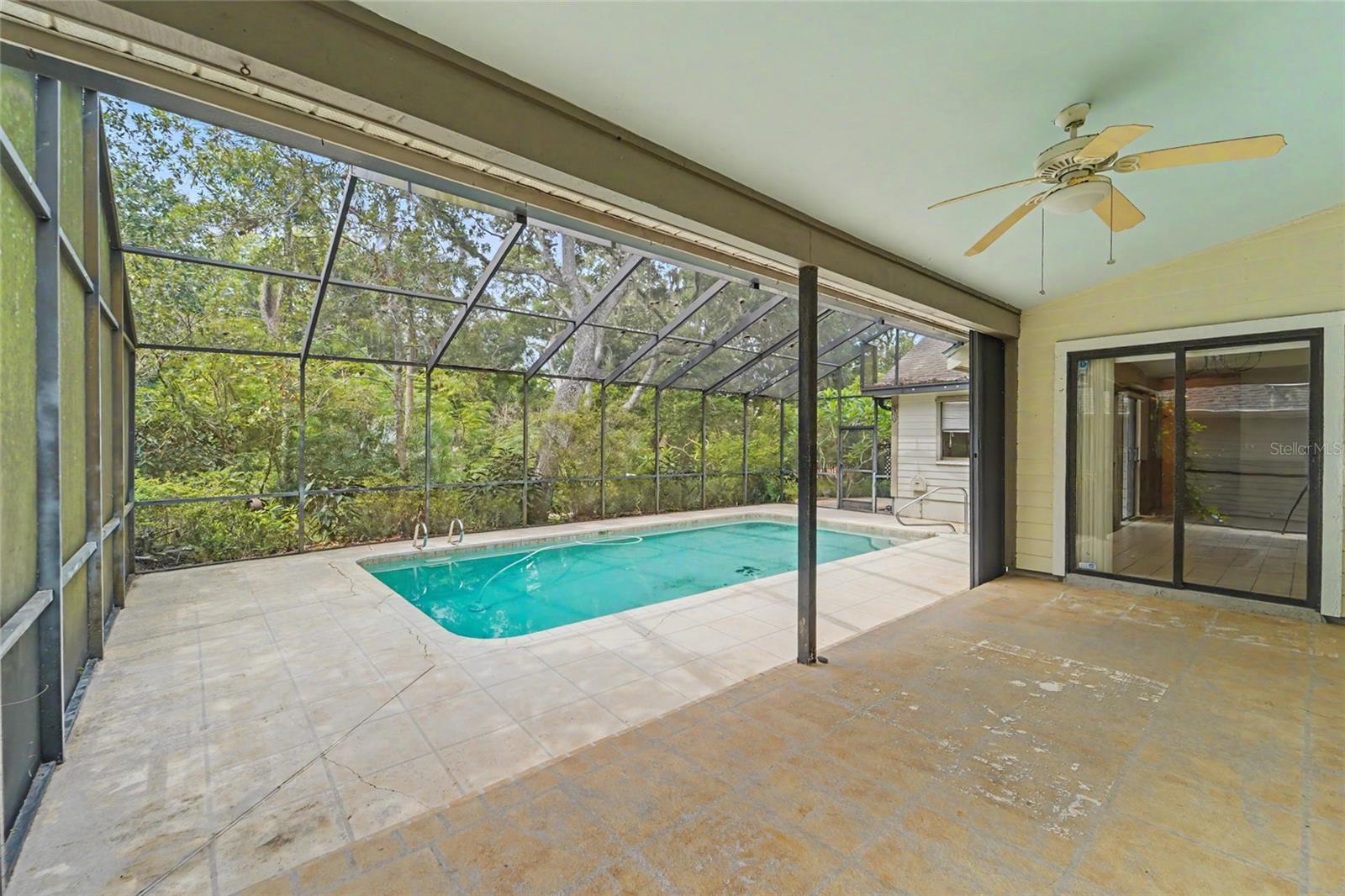 Covered lanai, birdcage pool and backs to a preserve!