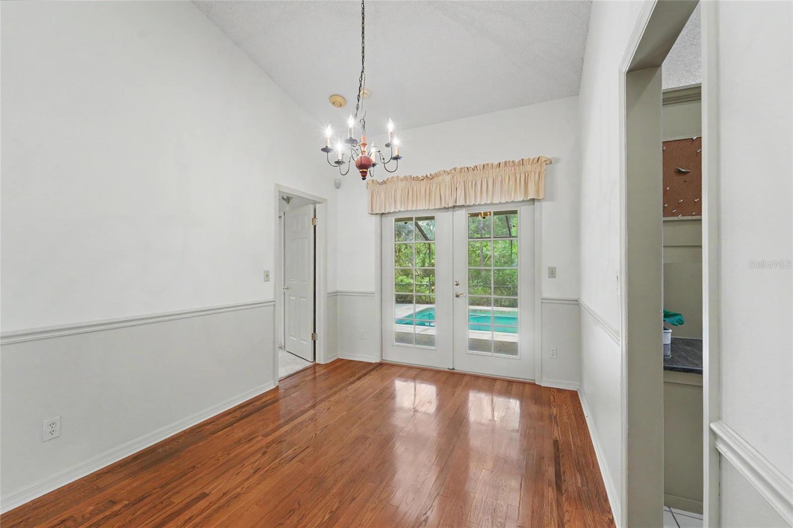 Dining room with French doors to pool
