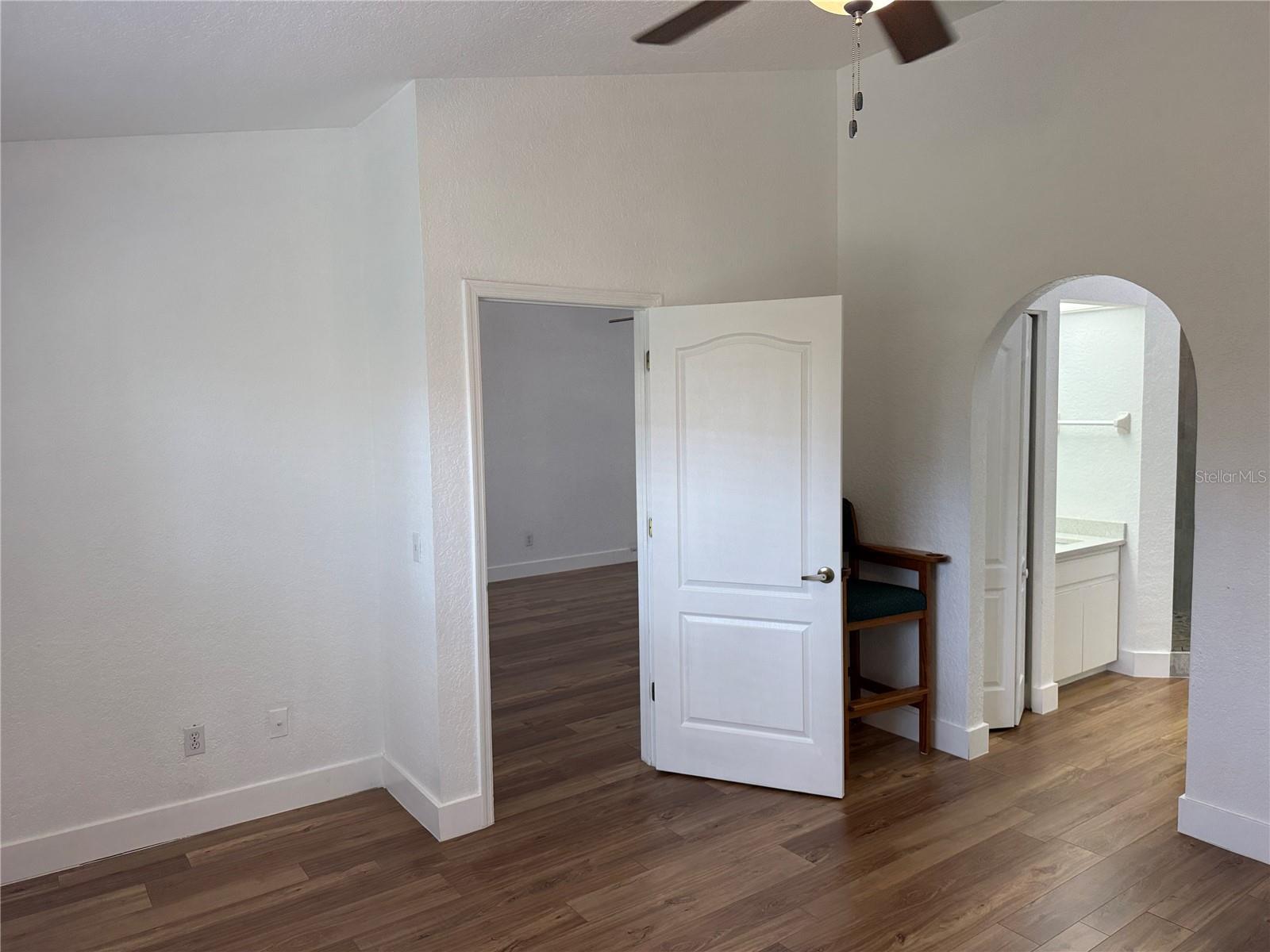 Primary bedroom leading to En Suite bath and walk in closet.