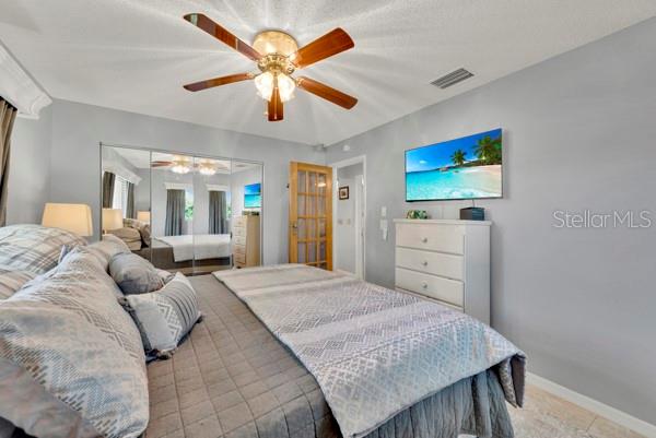 PRIMARY BEDROOM WITH KING BED