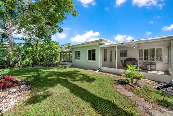 BACK OF HOUSE WITH YARD