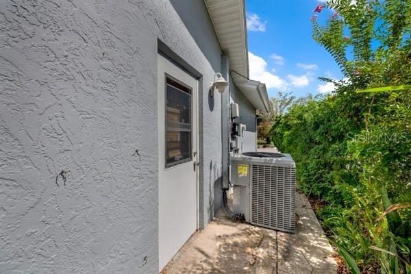 SIDE YARD WITH NEW A.C.