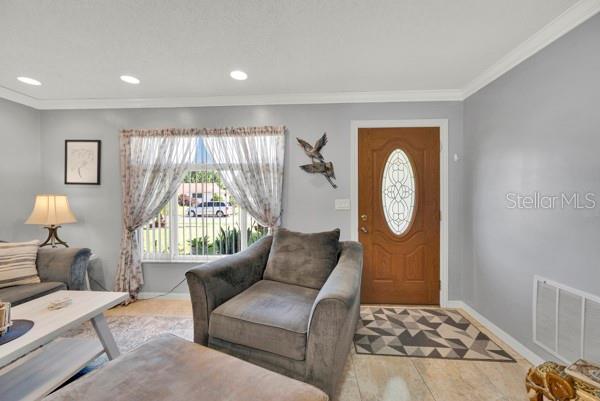ENTRANCE TO LIVINGROOM WITH GORGEOUS ENTRANCE WITH GORGEOUS DOOR