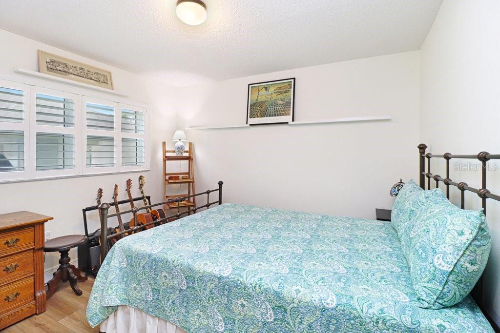Secondary Bedroom off of Entryway and Kitchen