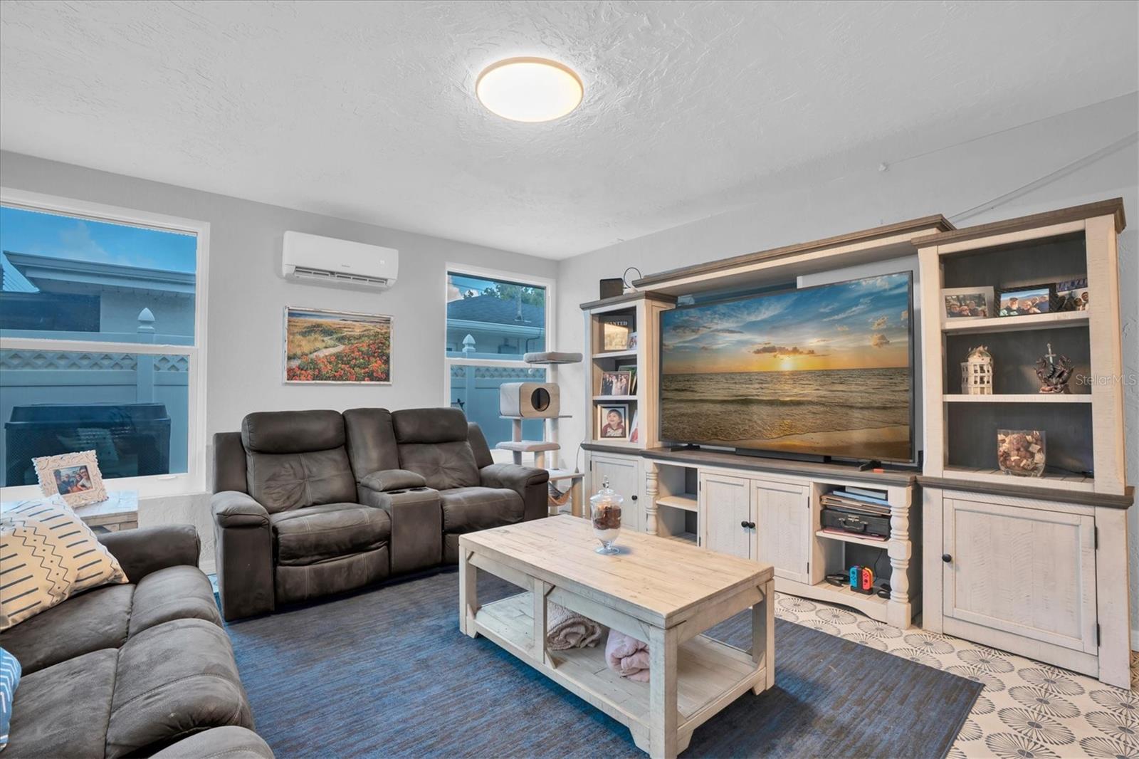 LIVING ROOM WITH ACCESS TO POOL AREA!