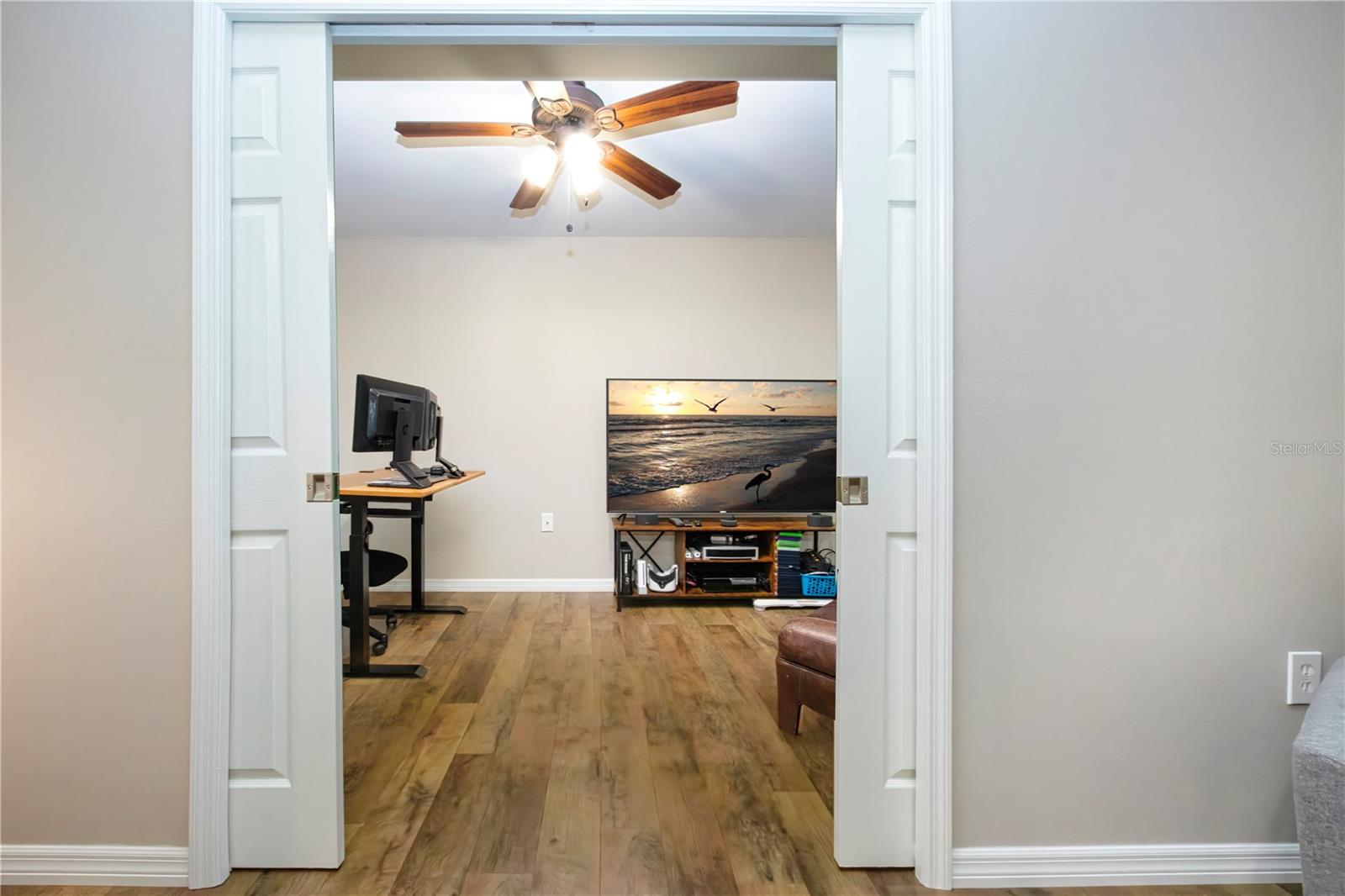 Pocket doors sepatate the private office from the owners suite