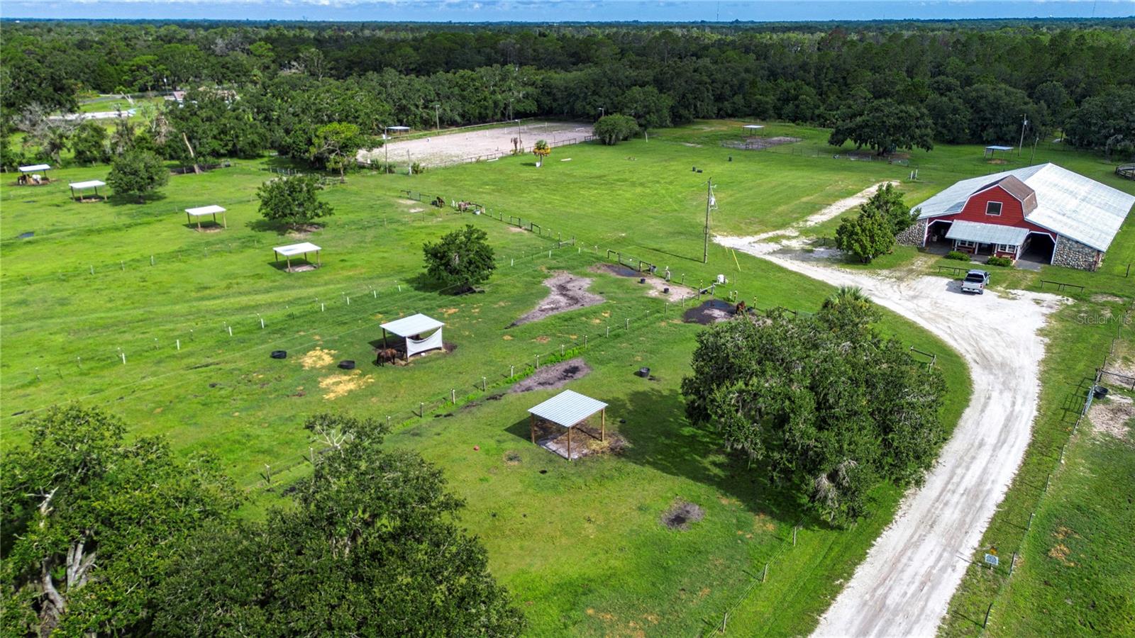 Sundance Stables with view of the lighted arena