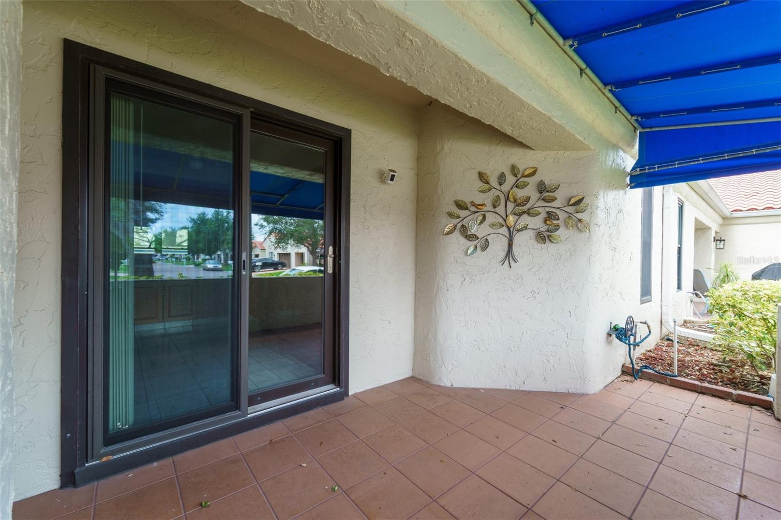 Outdoor front patio that opens to kitchen