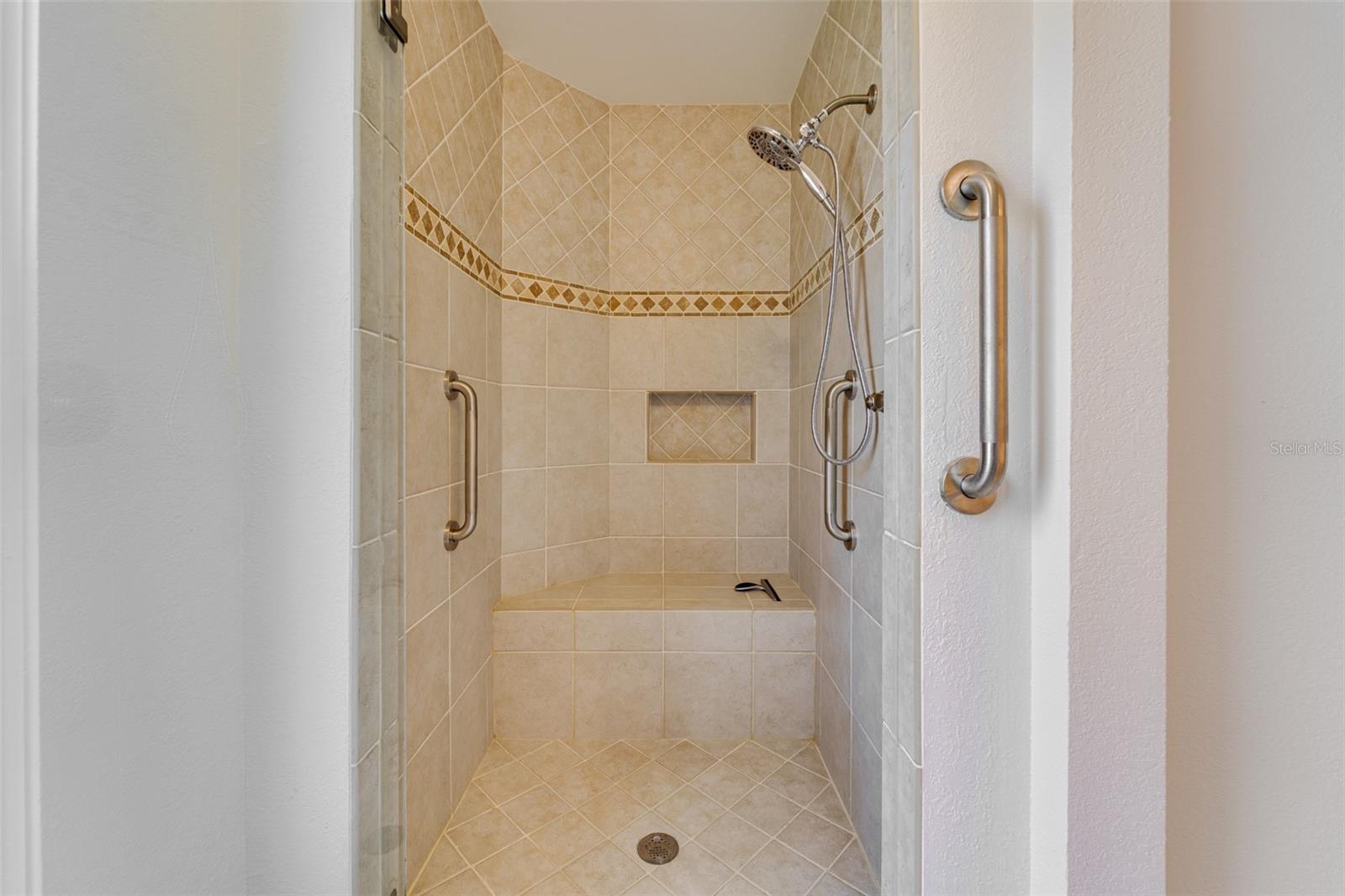 Large walk in shower in suite
