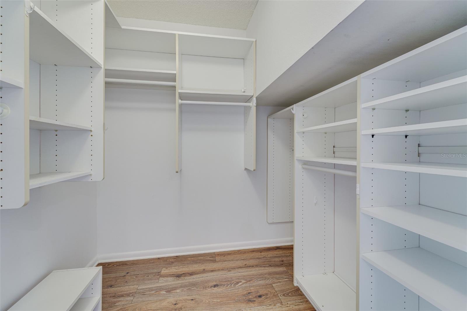 Walk in closet in suite