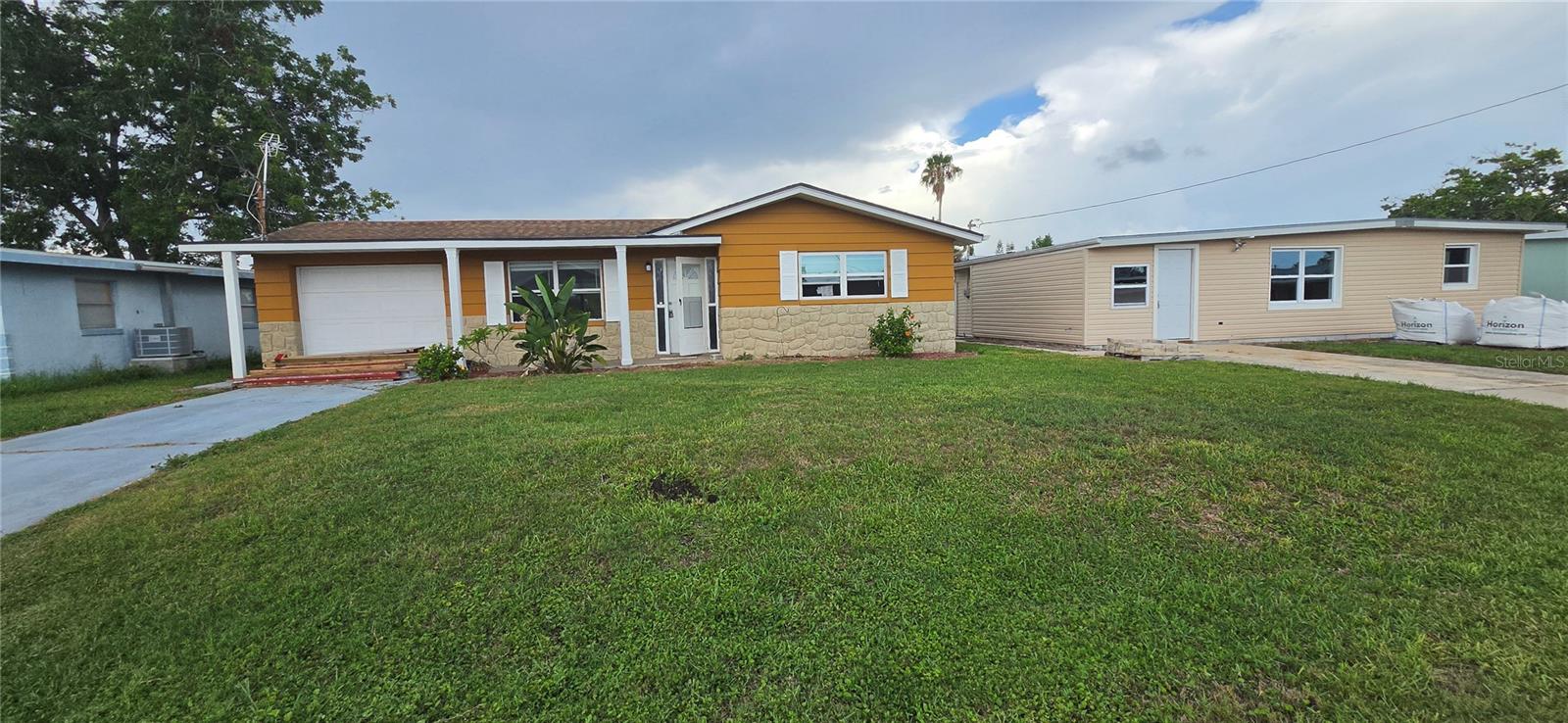 2 homes for sale side by side. 13320 Carol Drive