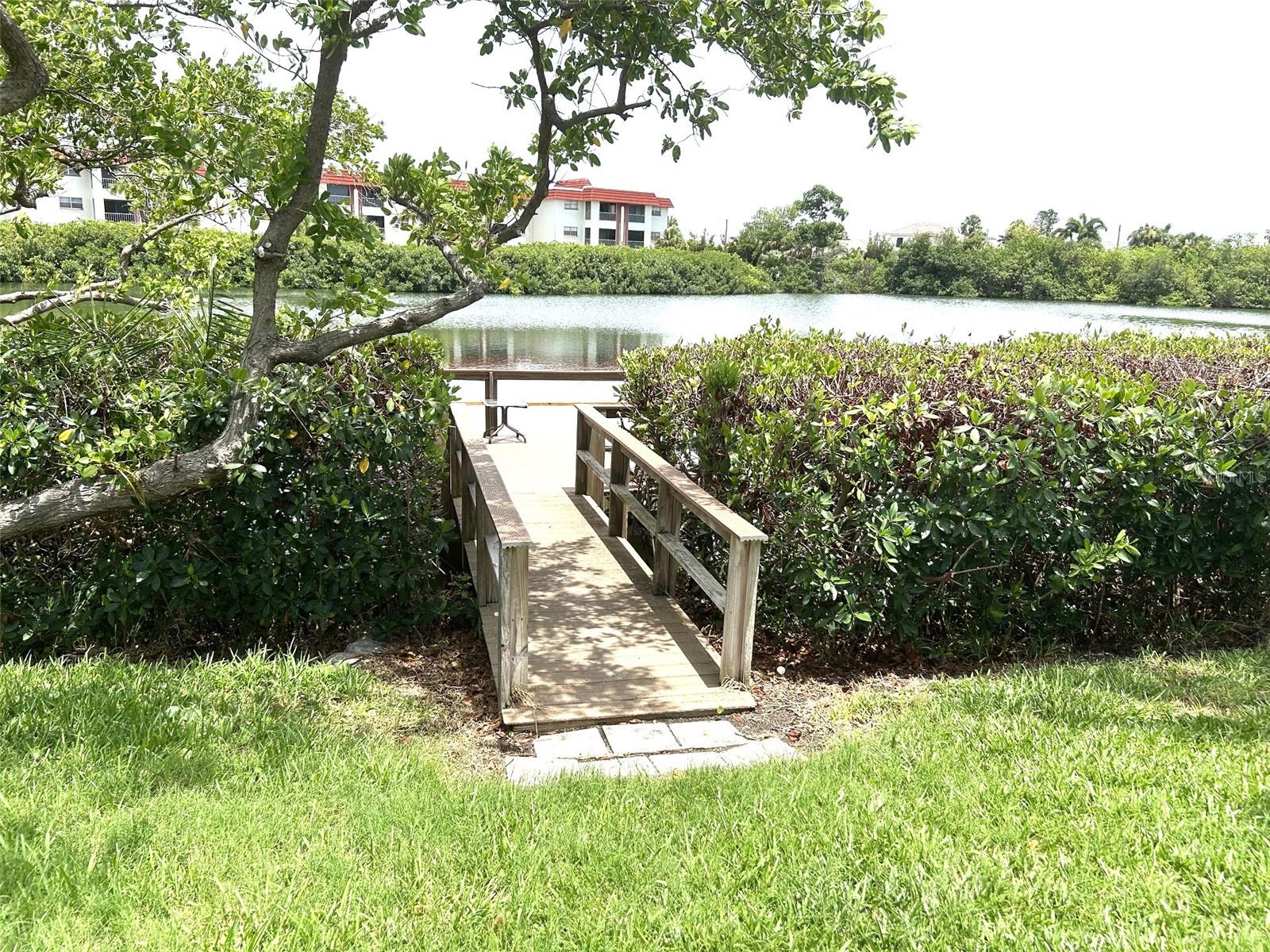 Walkway to deck by the pond adjacent to clubhouse