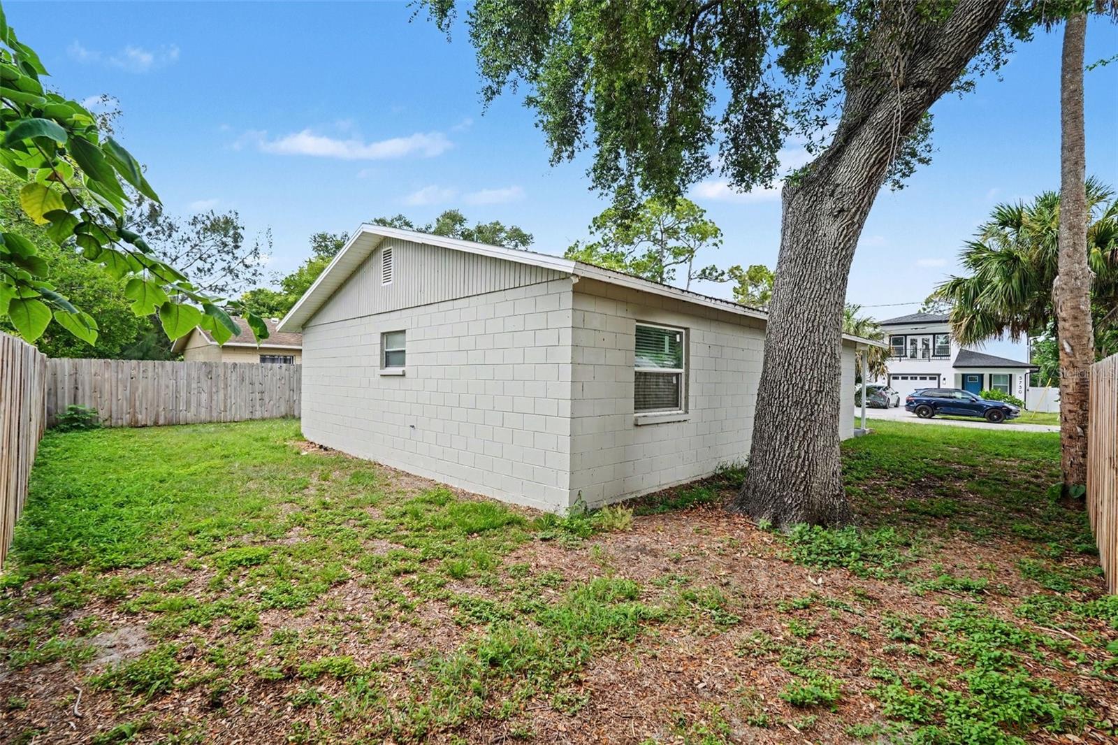 Additional side yard space provides even more room for pets, recreation, or storage.