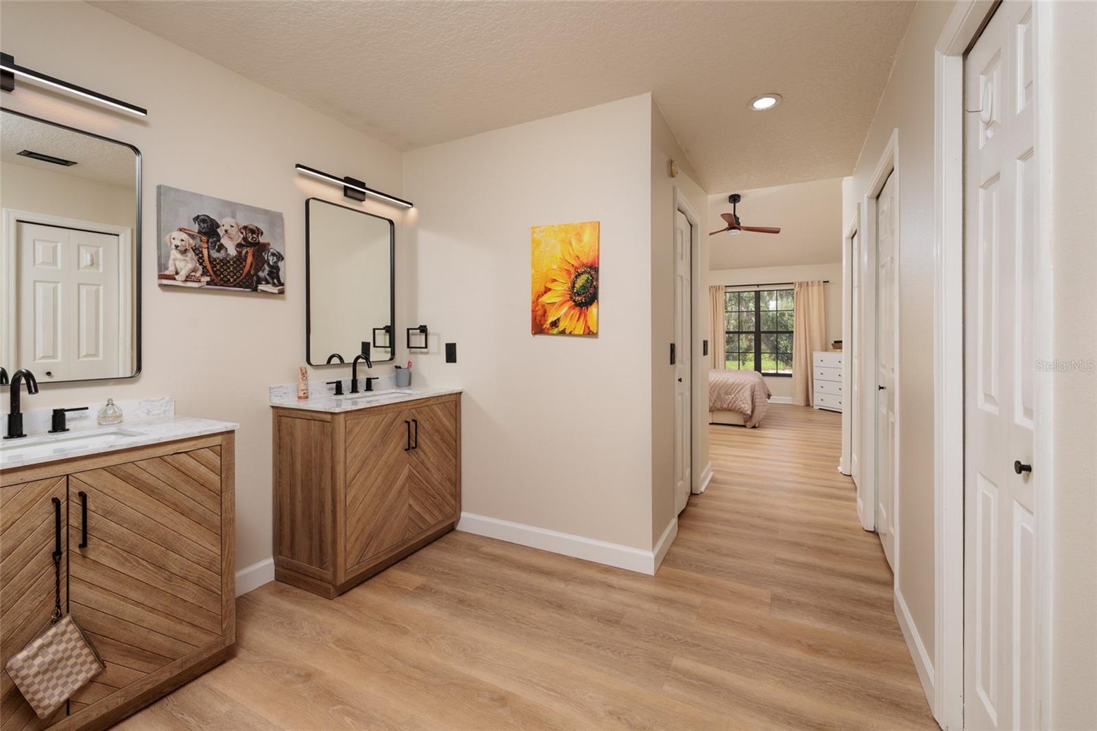 master bathroom with closets