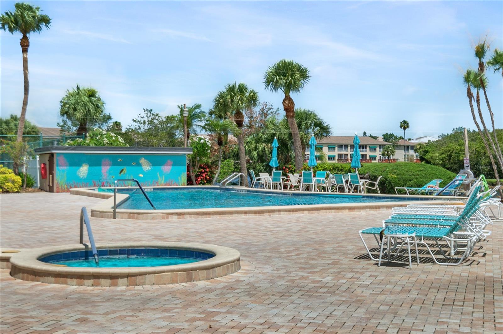 Pool and hot tub betweenrecreation center and theshores of Long Bayou