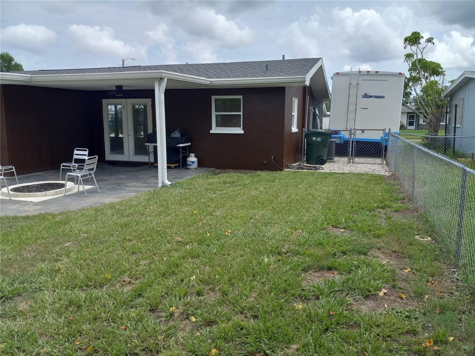 14 x 20 covered patio with slate flooring. opens through french doors off kitchen