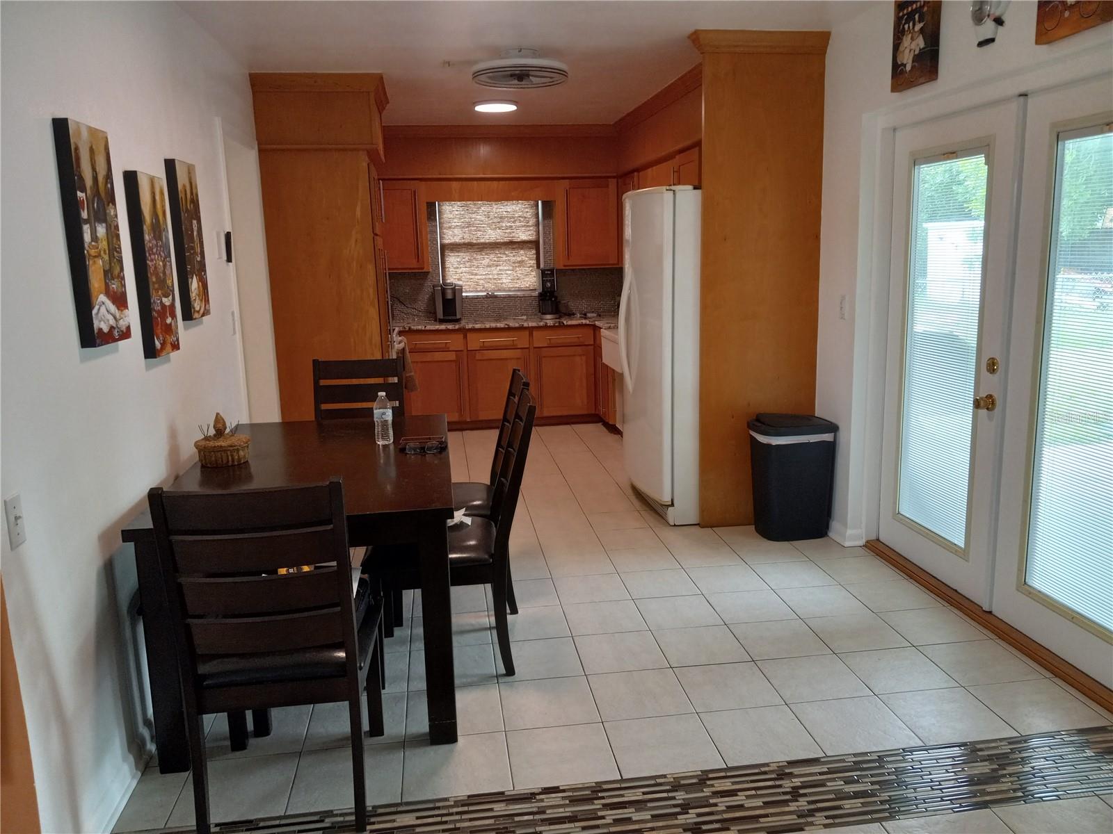 looking into updated kitchen, upgraded cabinets, granite countertops, ceramic tile flooring