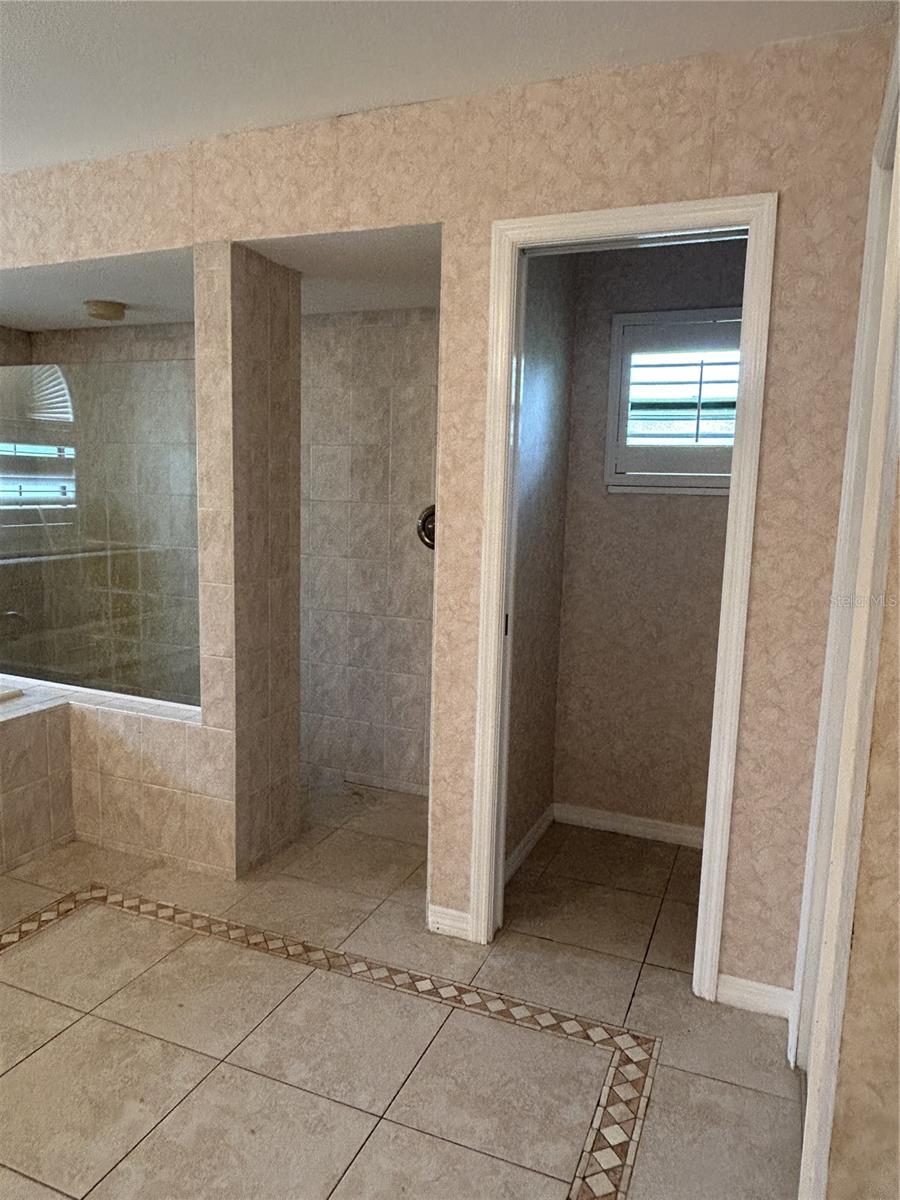 walk in shower and private toilet