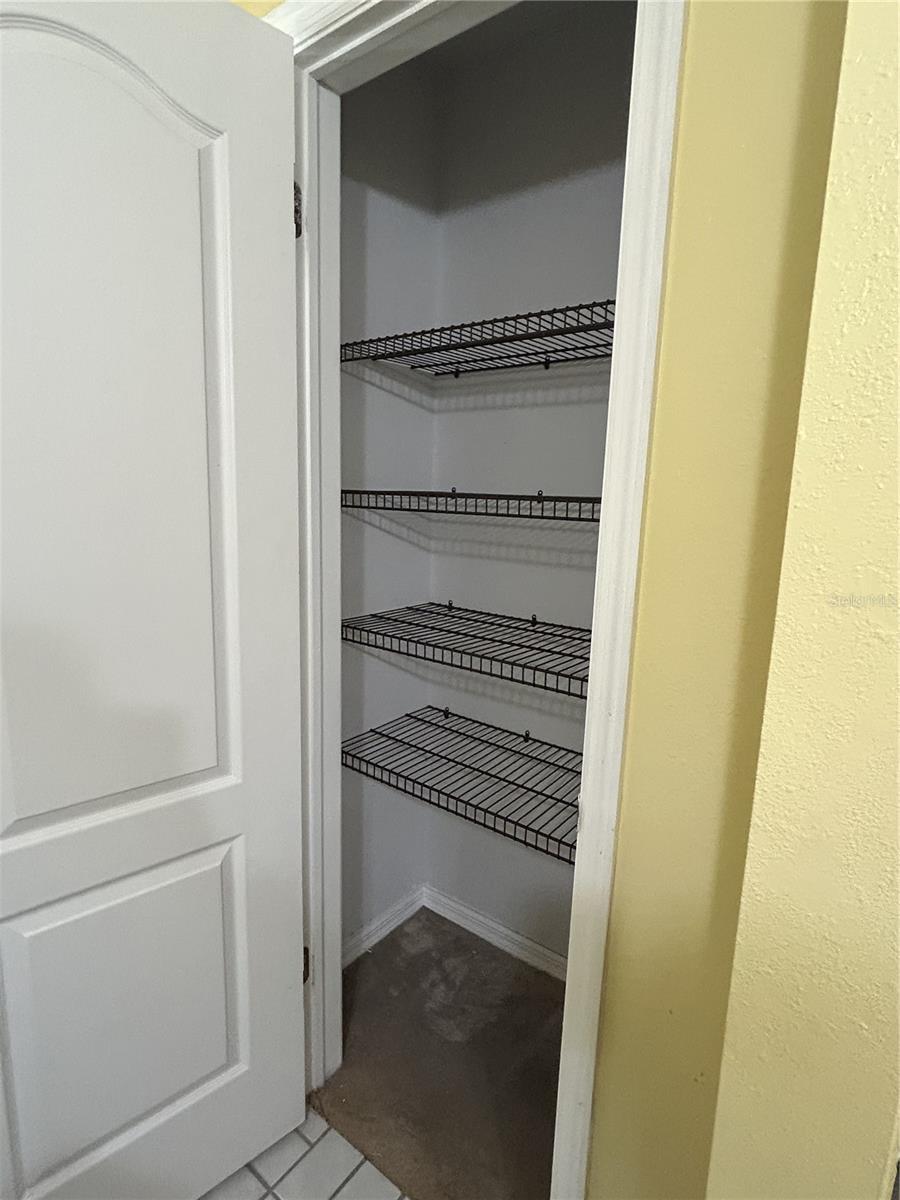 linen closet in main bathroom