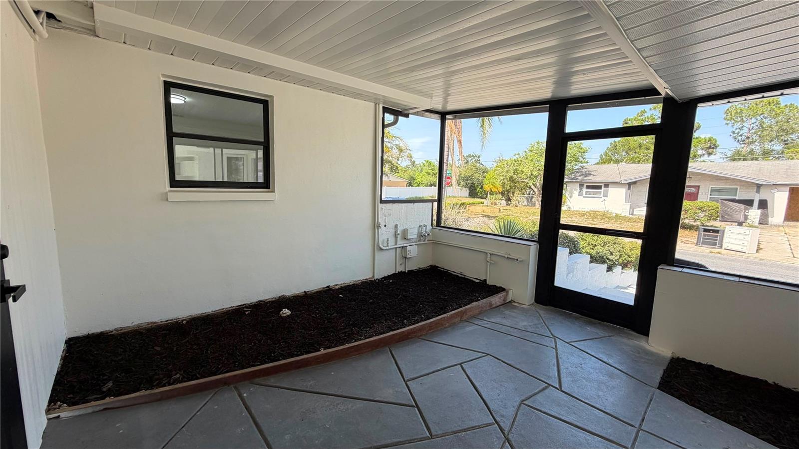 Separate entrance behind the house to the Mother-in-law suite with bathroom