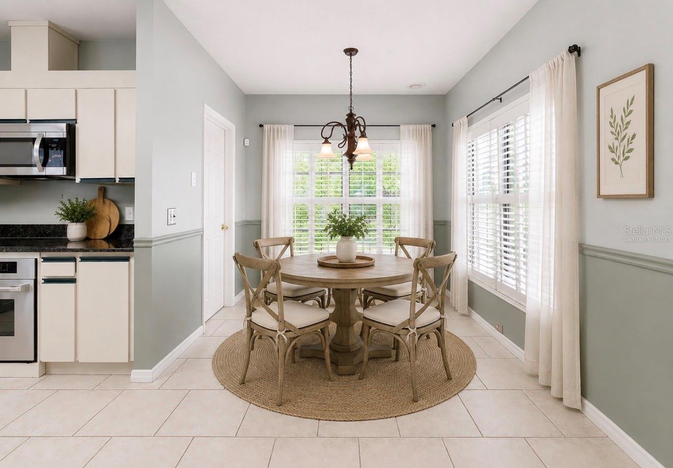 Virtually staged dining in kitchen