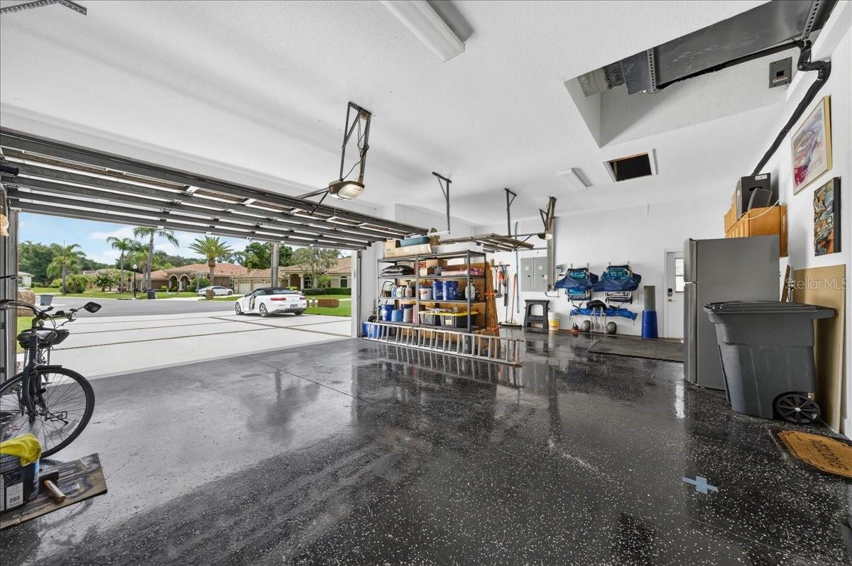 Three car garage with epoxy flooring