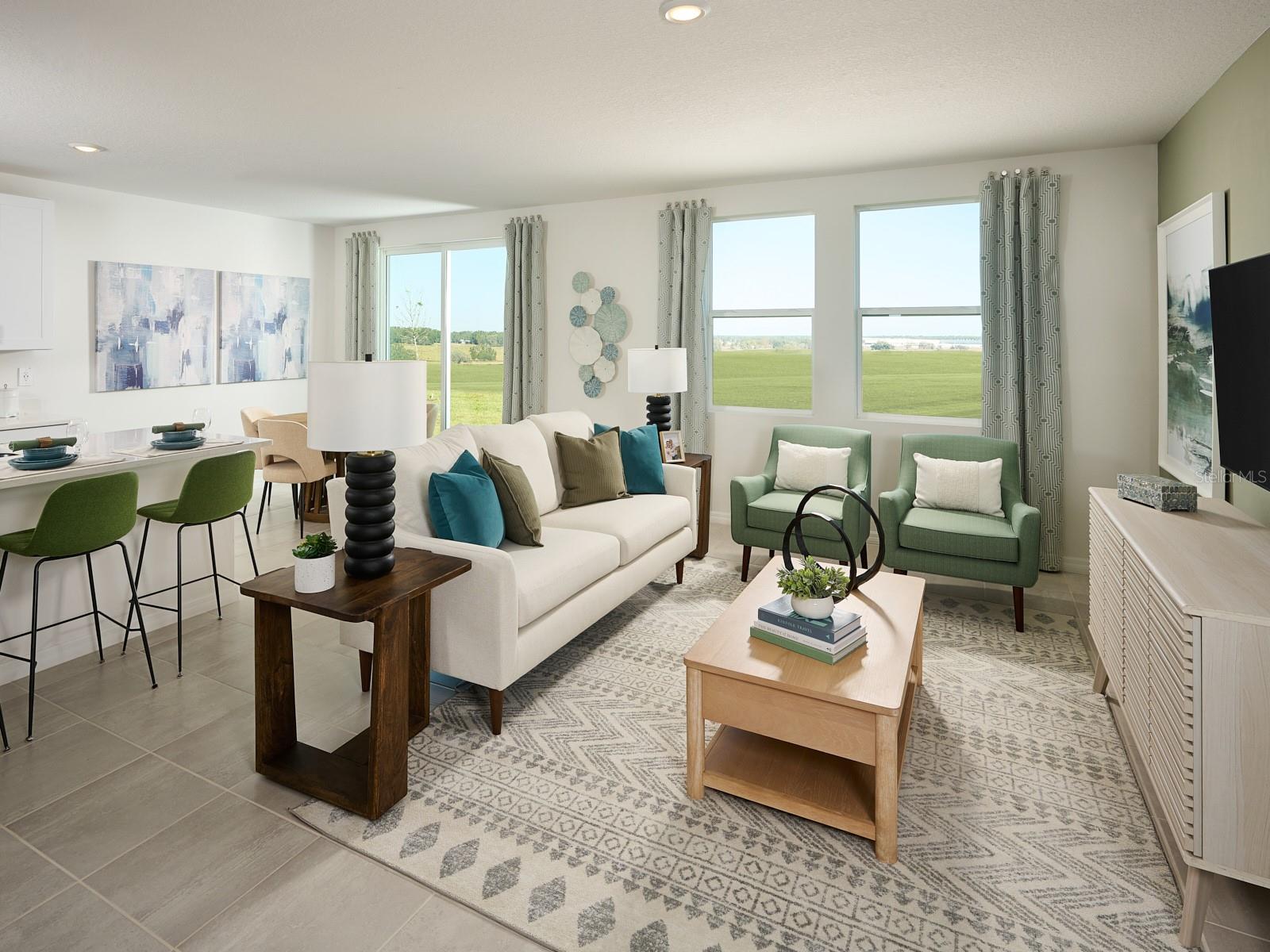 Photos are not of the actual home, but are photos of the builder home with same floorplan with similar interior finishes.