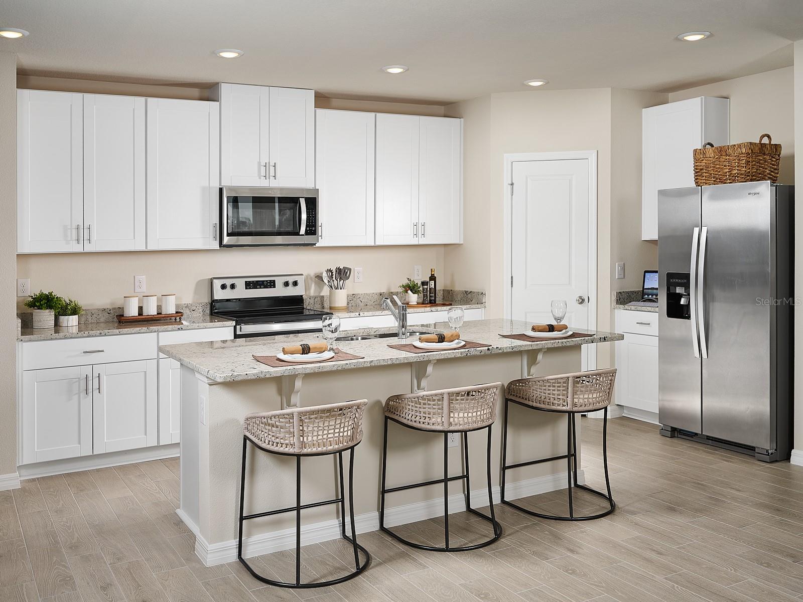Photos are not of the actual home, but are photos of the builder home with same floorplan with similar interior finishes.